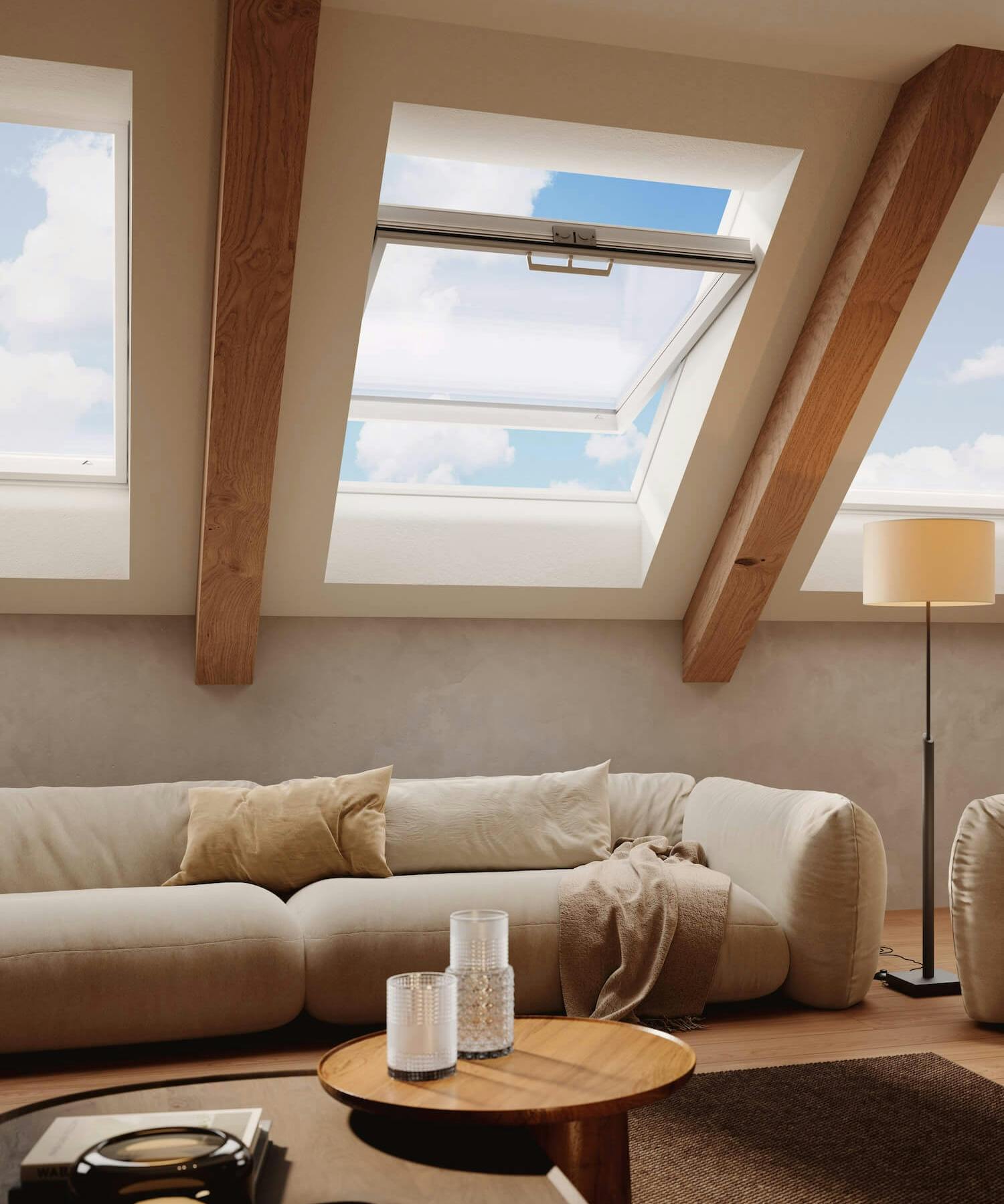 Roto Dachfenster in einem gemütlichen Wohnzimmer mit Holzelementen Roto Dachfenster in einem gemütlichen Wohnzimmer mit Holzelementen