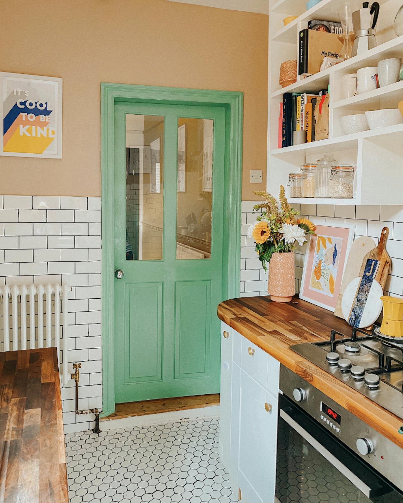 Vibrant green accent kitchen door