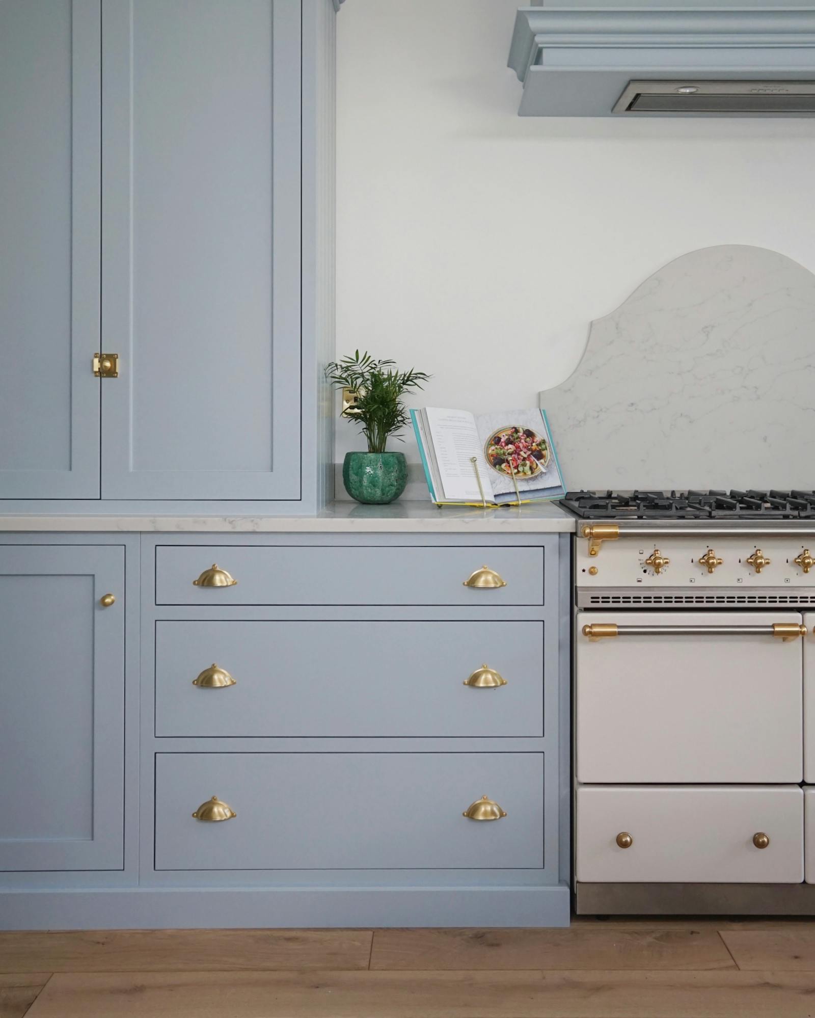 Kitchen cabinet painted in light blue