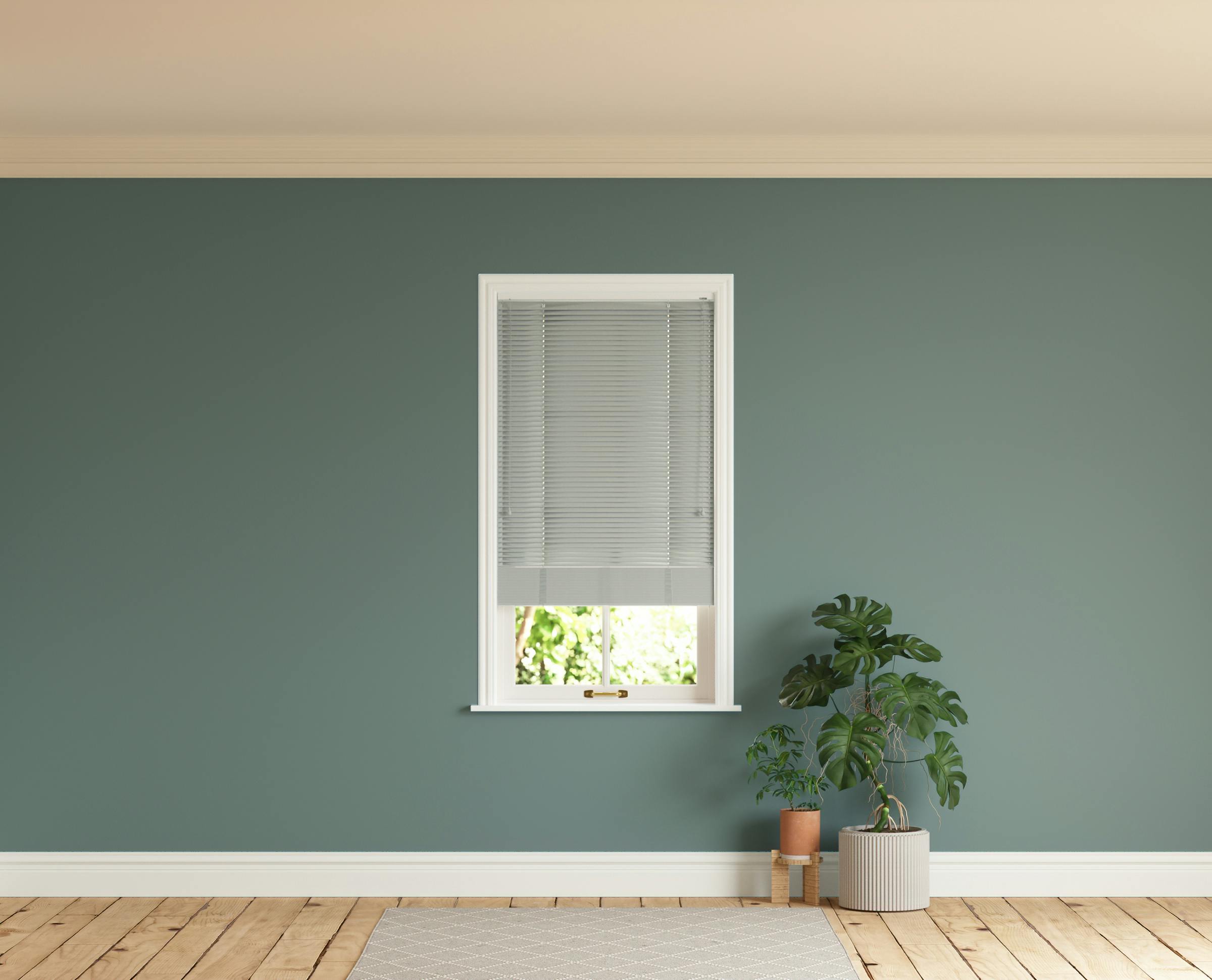 Room with walls painted in Lick Green 03 and Grey 04 Venetian fine grain blinds