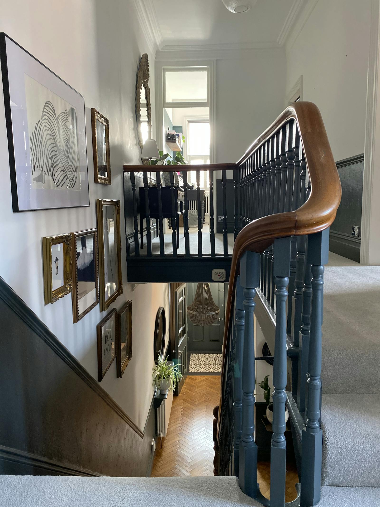 Staircase and gallery wall