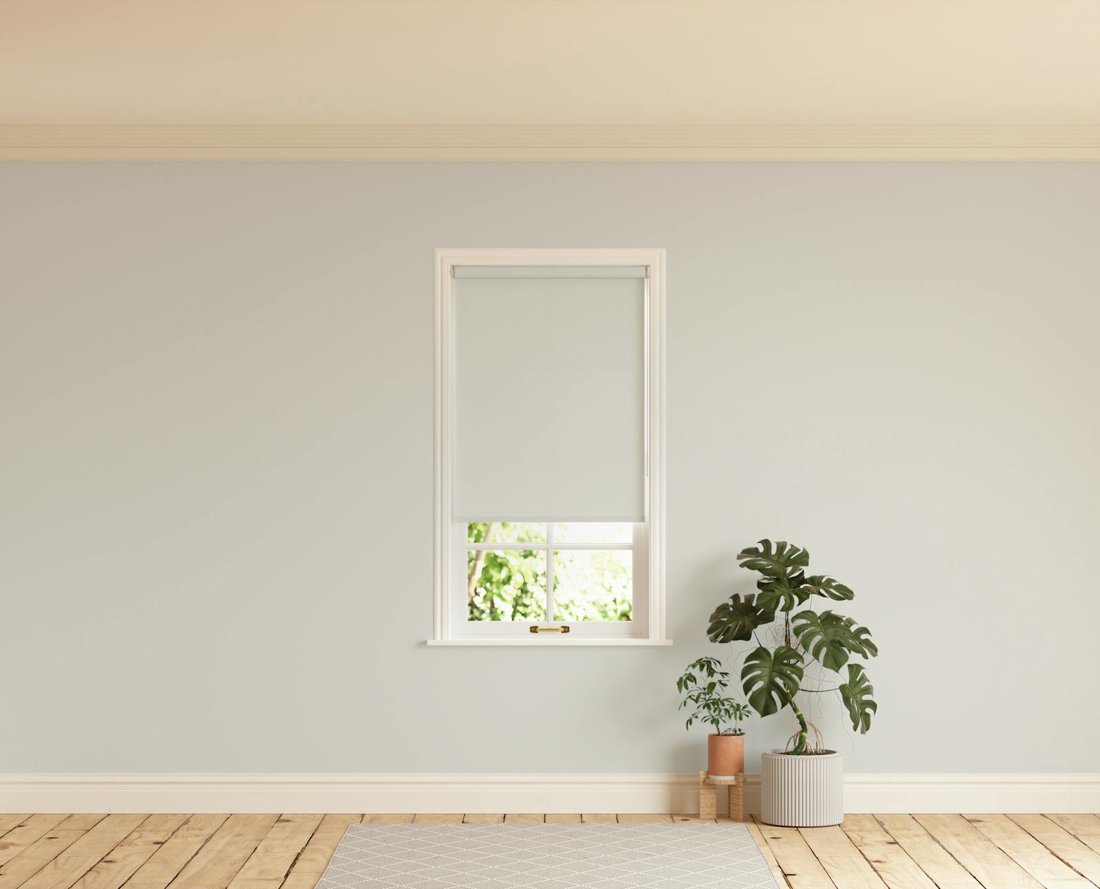 Room with walls painted in Lick Grey 02 and Grey 02 roller blinds
