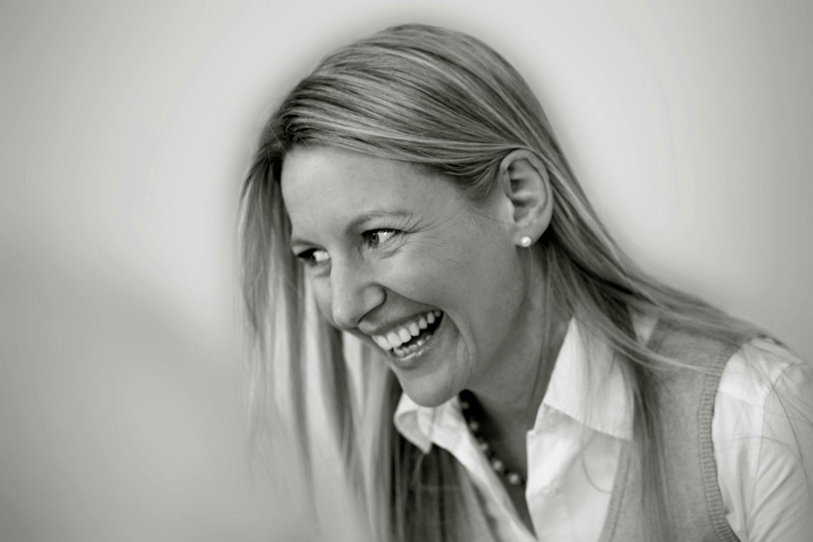 Black and white portrait of woman smiling