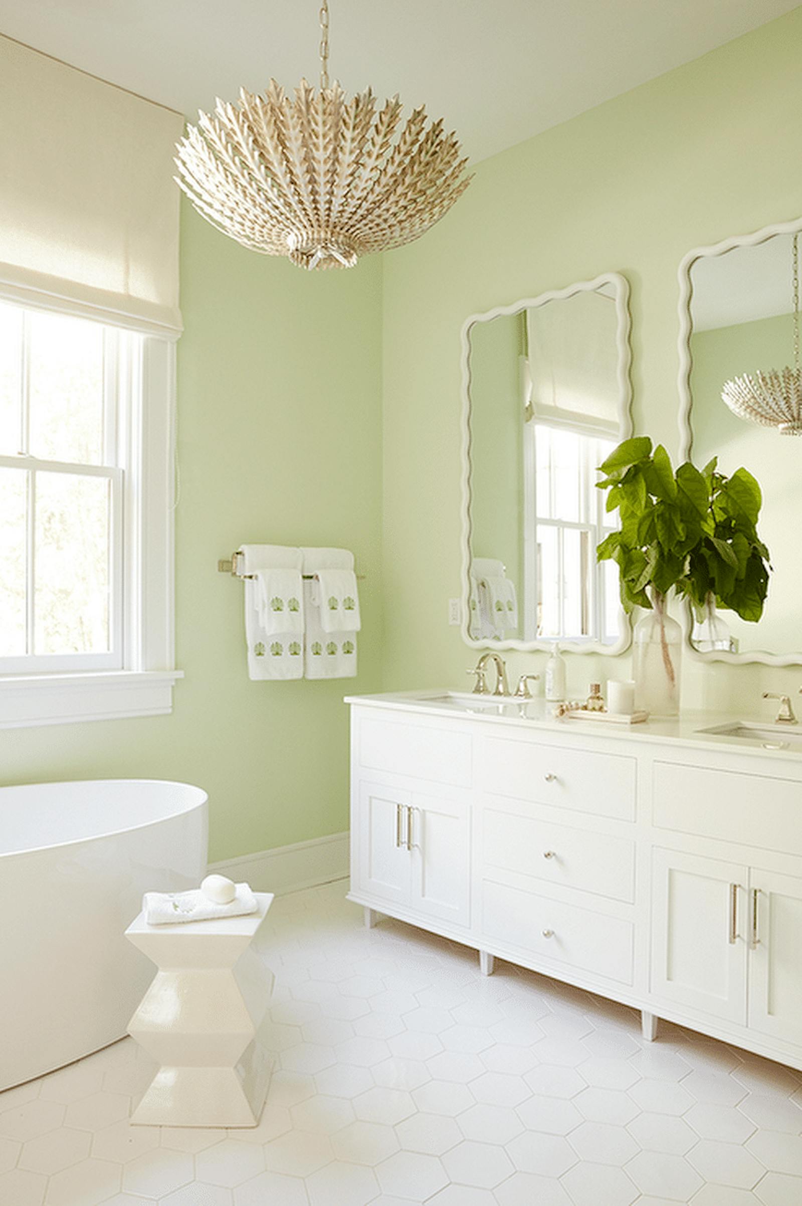 Vintage bathroom in light pastel green colour
