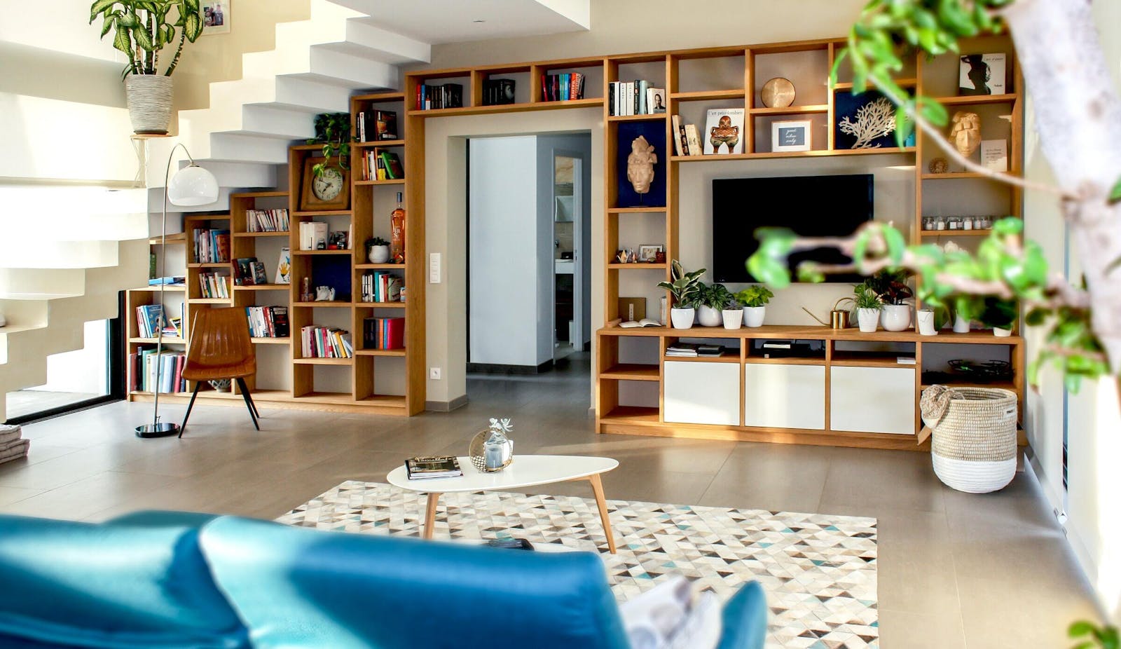 Living room with wooden built in storage