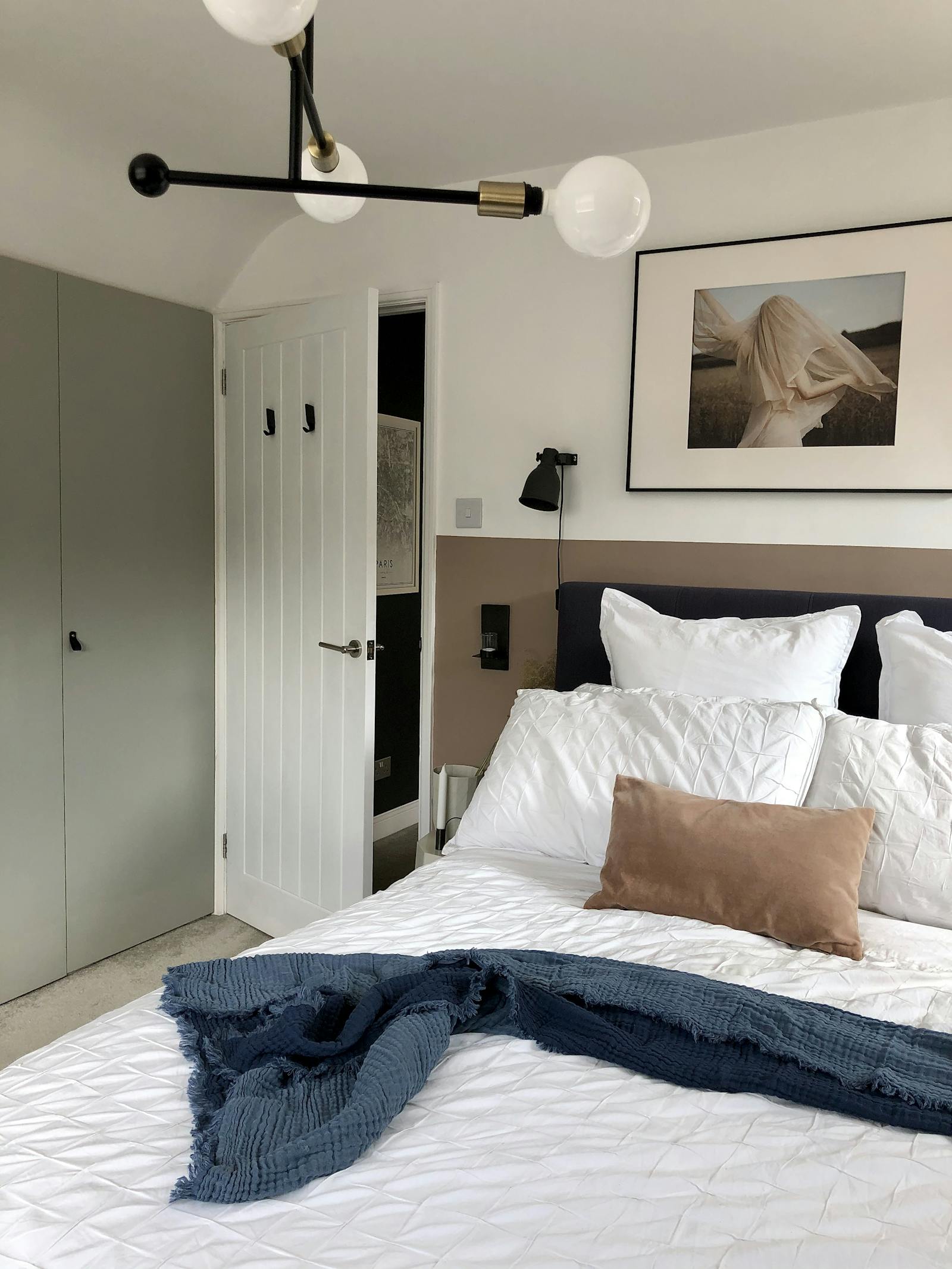 Bedroom with built in grey wardrobe