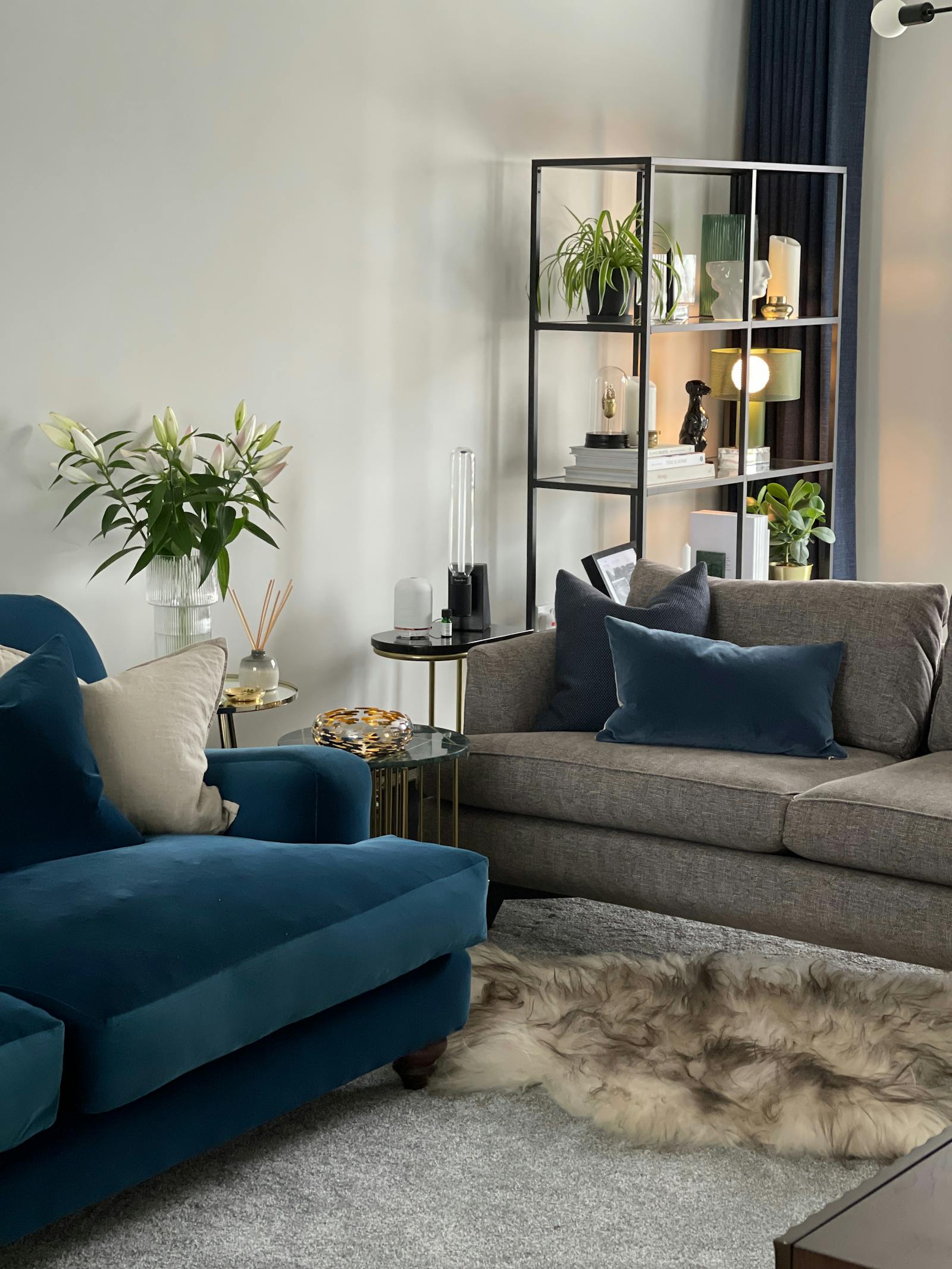 Scandinavian inspired living room with blue and grey furnishings