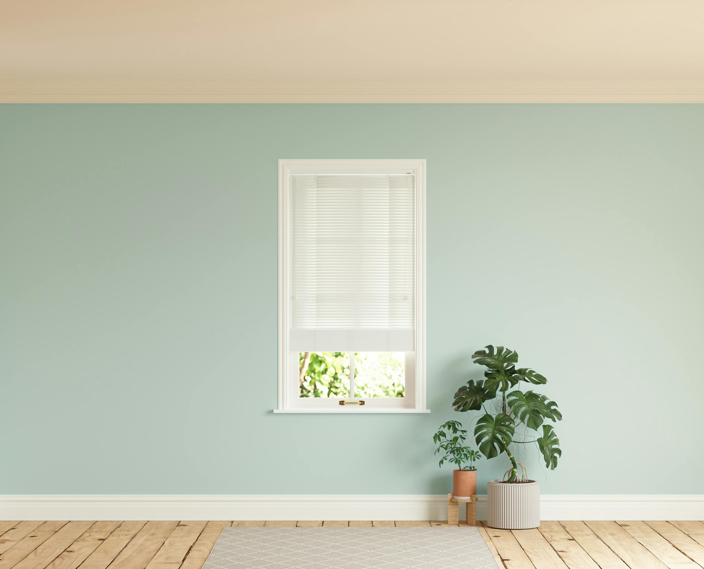 Room with walls painted in Lick Blue 03 and White 01 Venetian blinds
