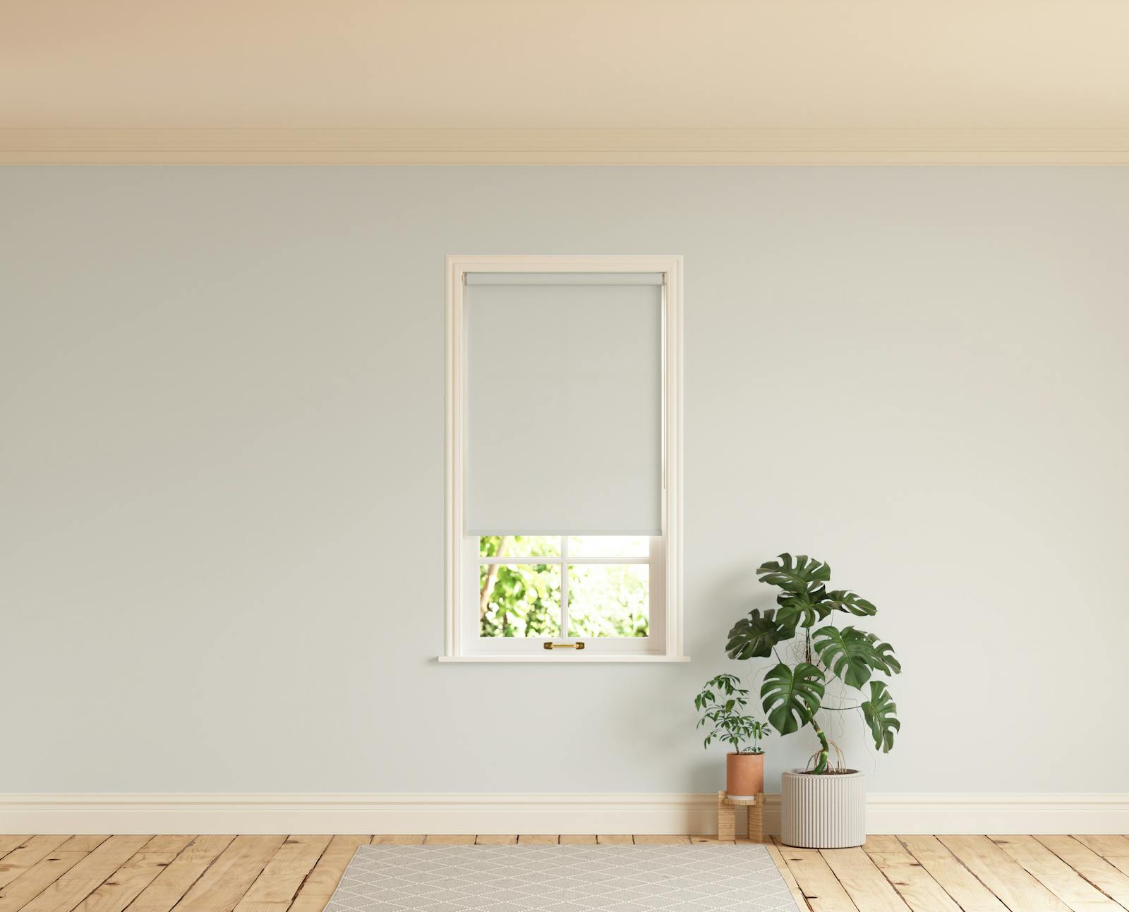Room with walls painted in Lick Grey 03 and Grey 03 roller blinds