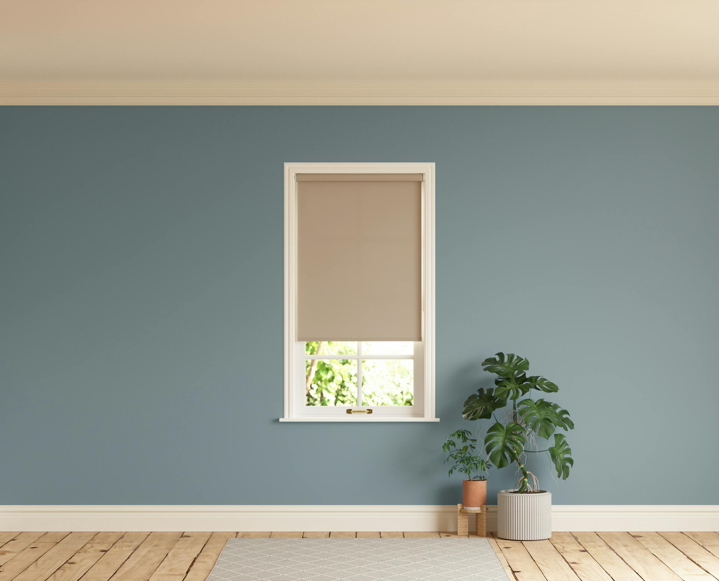 Room with walls painted in Lick Teal 02 and Beige 02 roller blinds