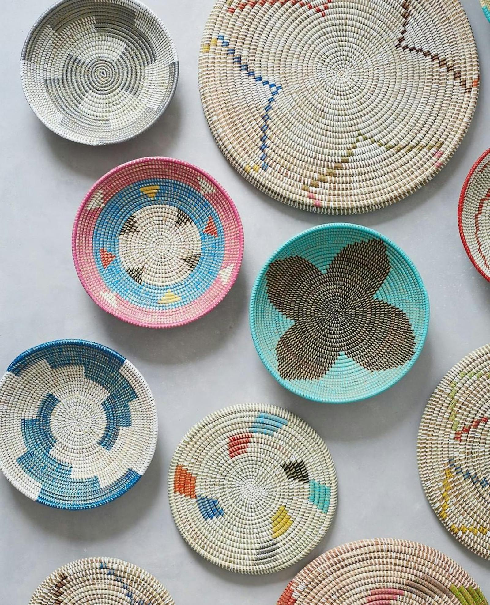 A selection of woven baskets and placemats