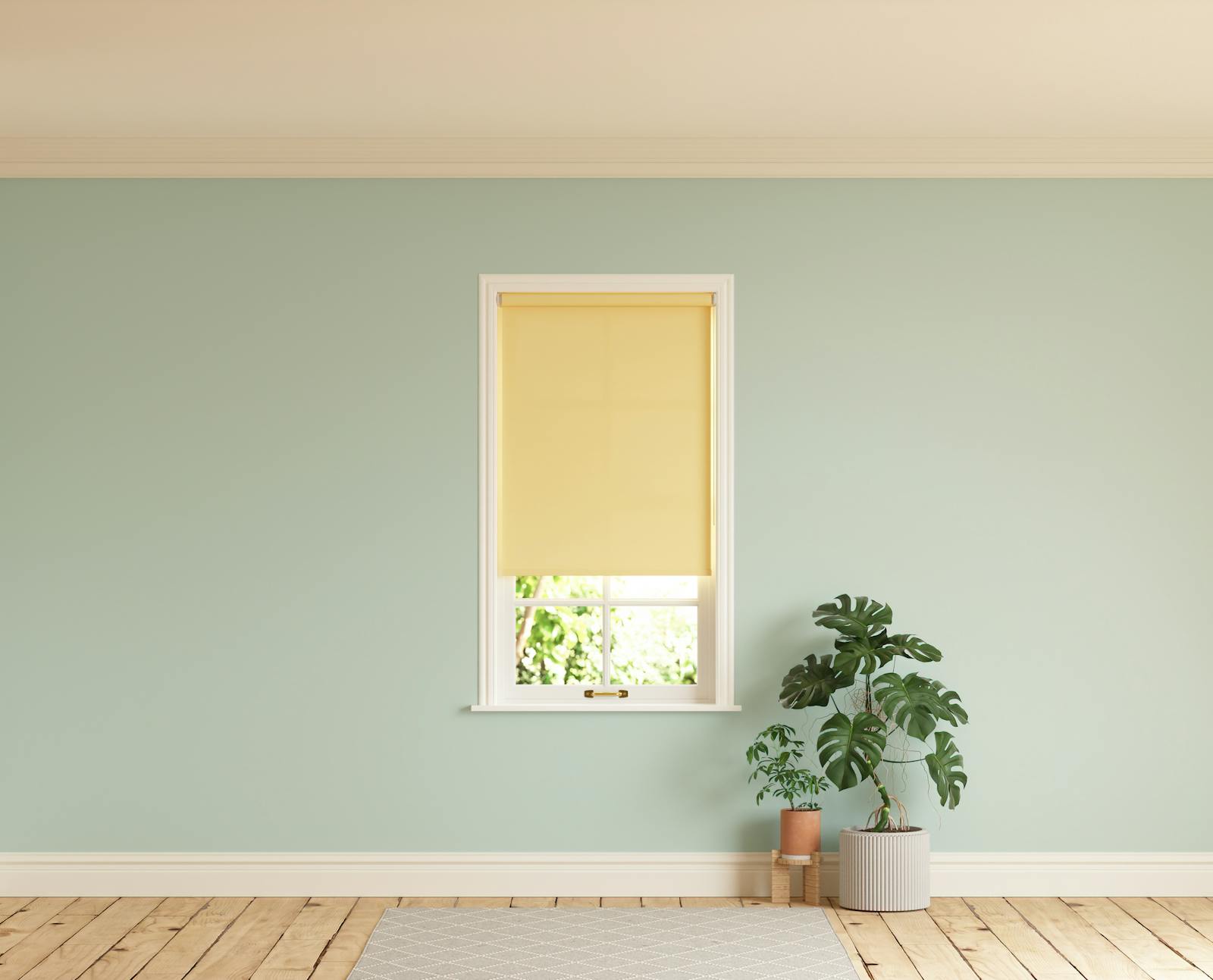 Room with walls painted in Lick Blue 03 and Yellow 01 roller blinds