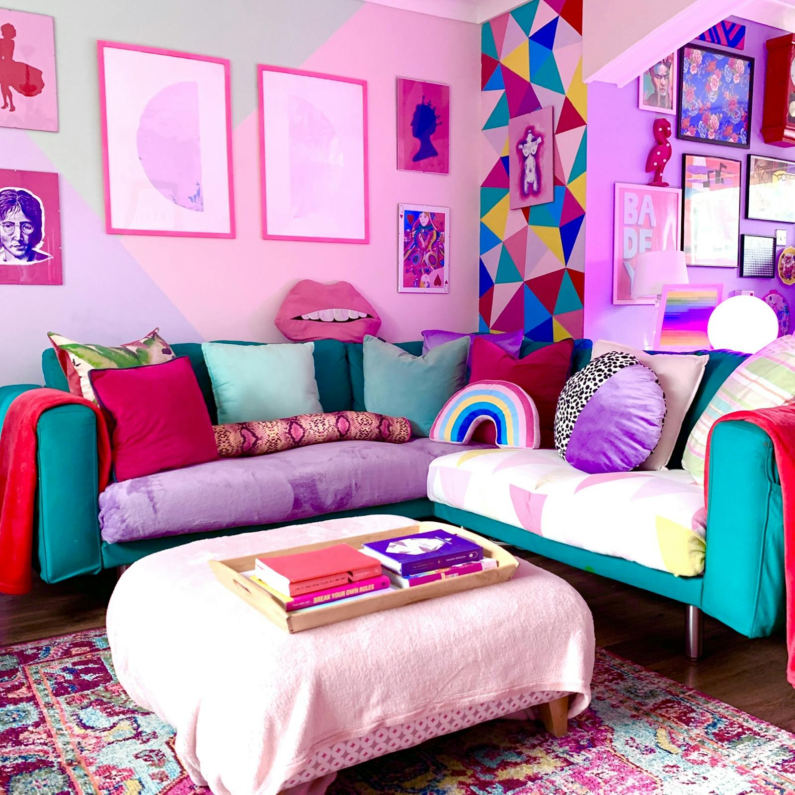 Teal sofa in a pink and purple living room