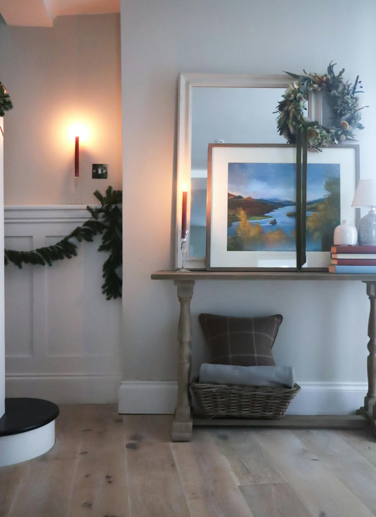 Hallway decoration in Christmas foliage and candles