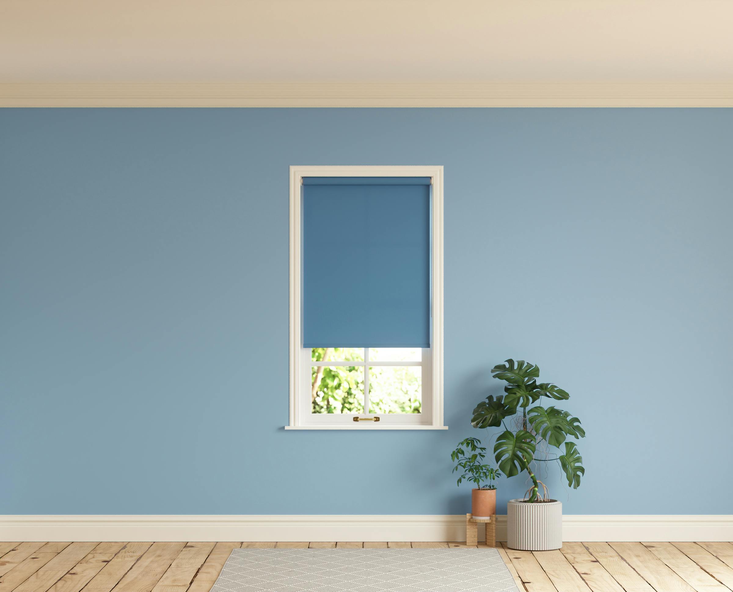 Room with walls painted in Lick Blue 04 and Blue 05 roller blinds