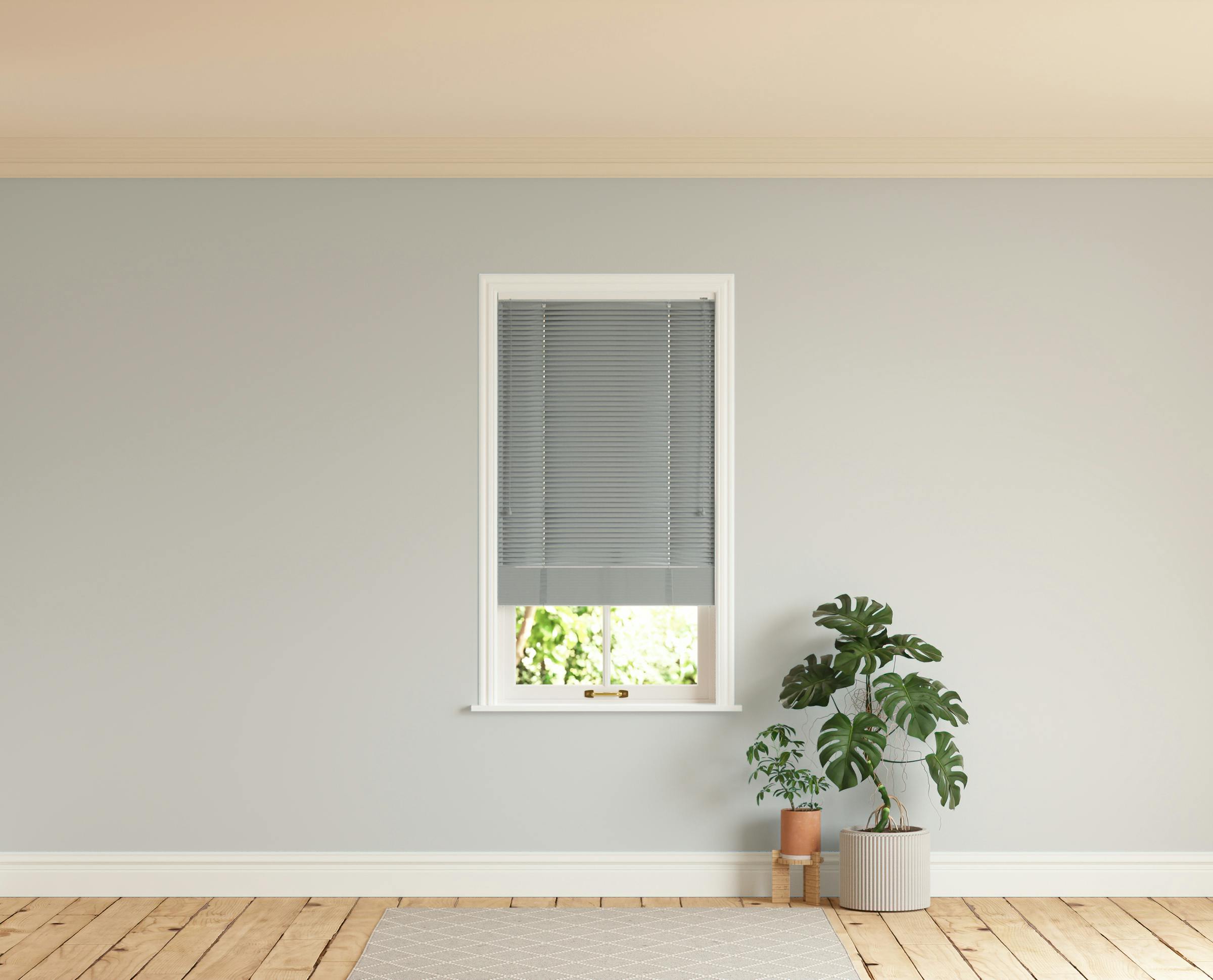 Room with walls painted in Lick Grey 03 and Grey 06 Venetian blinds