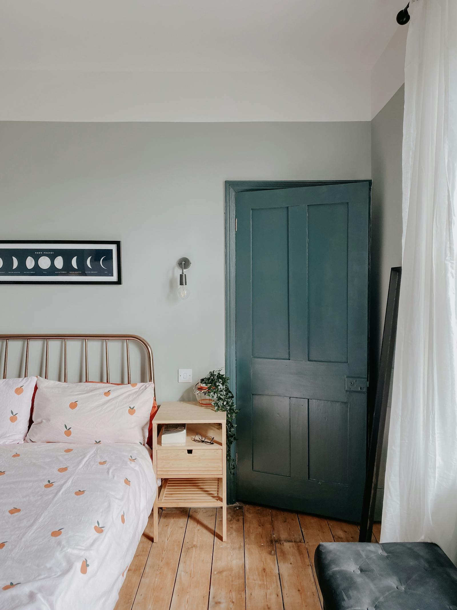 Mint colour bedroom walls and teal coloured bedroom door