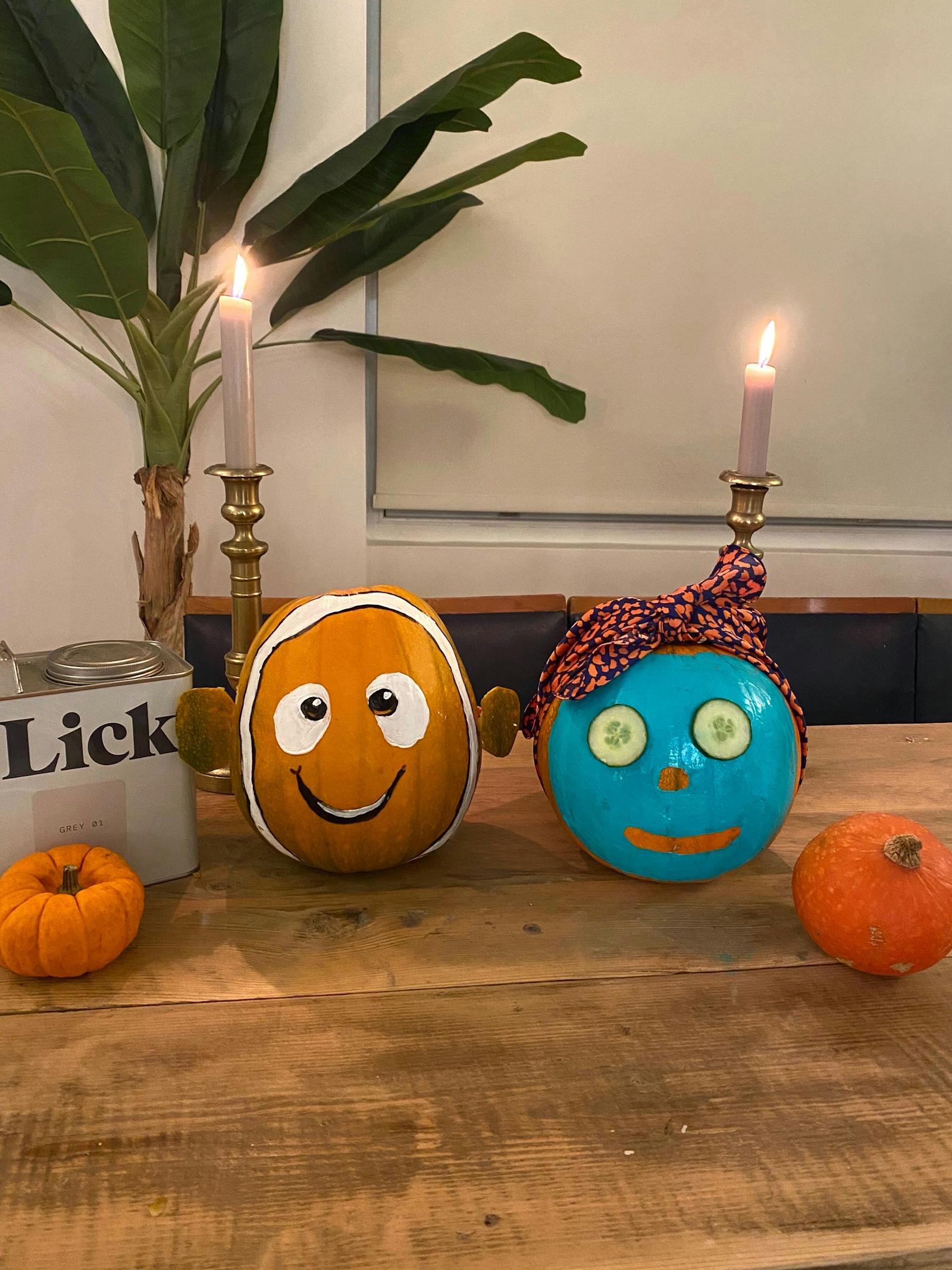 Pumpkins painted as Nemo or a face with cucumbers