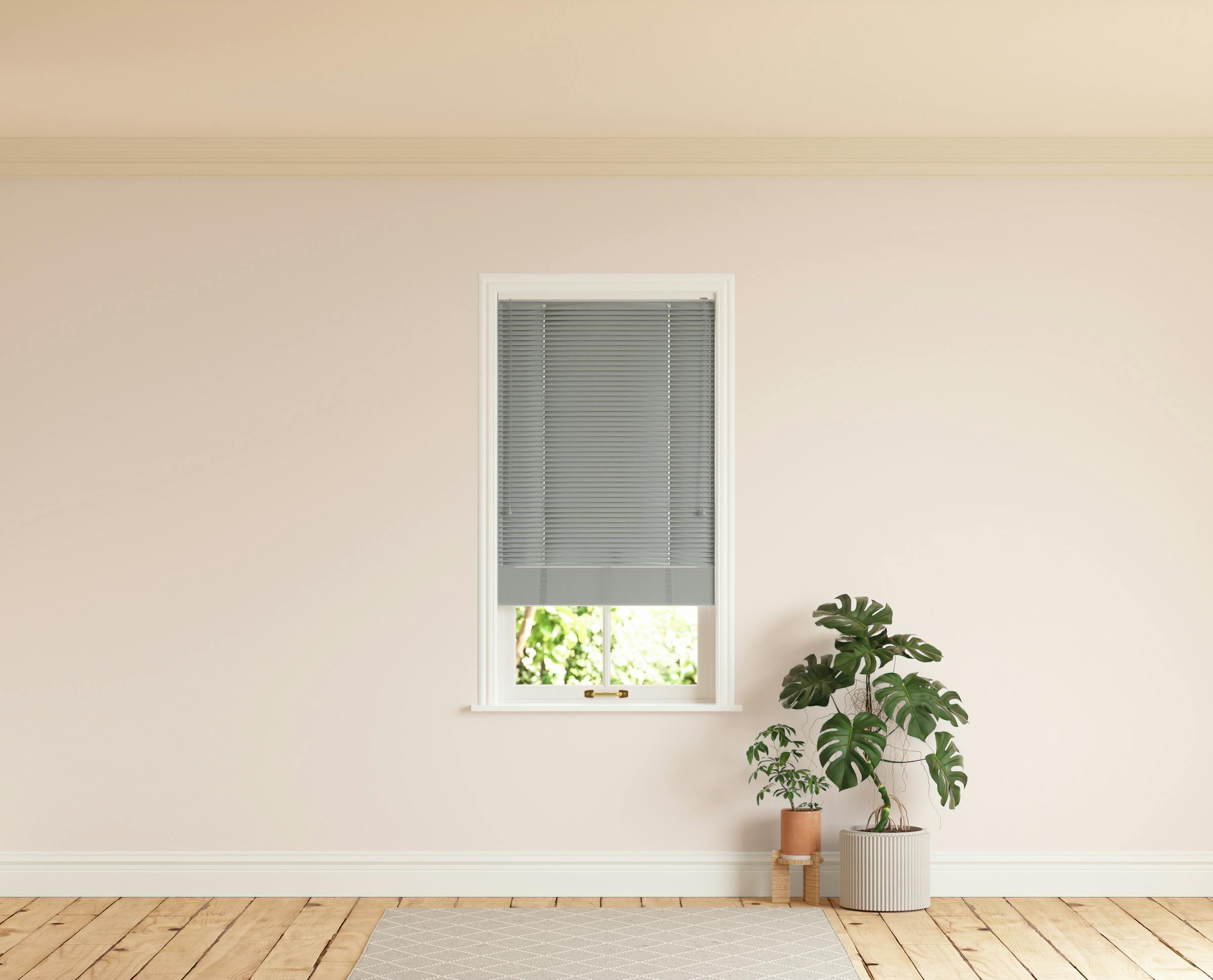 Room with walls painted in Lick Pink 01 and Grey 06 Venetian blinds