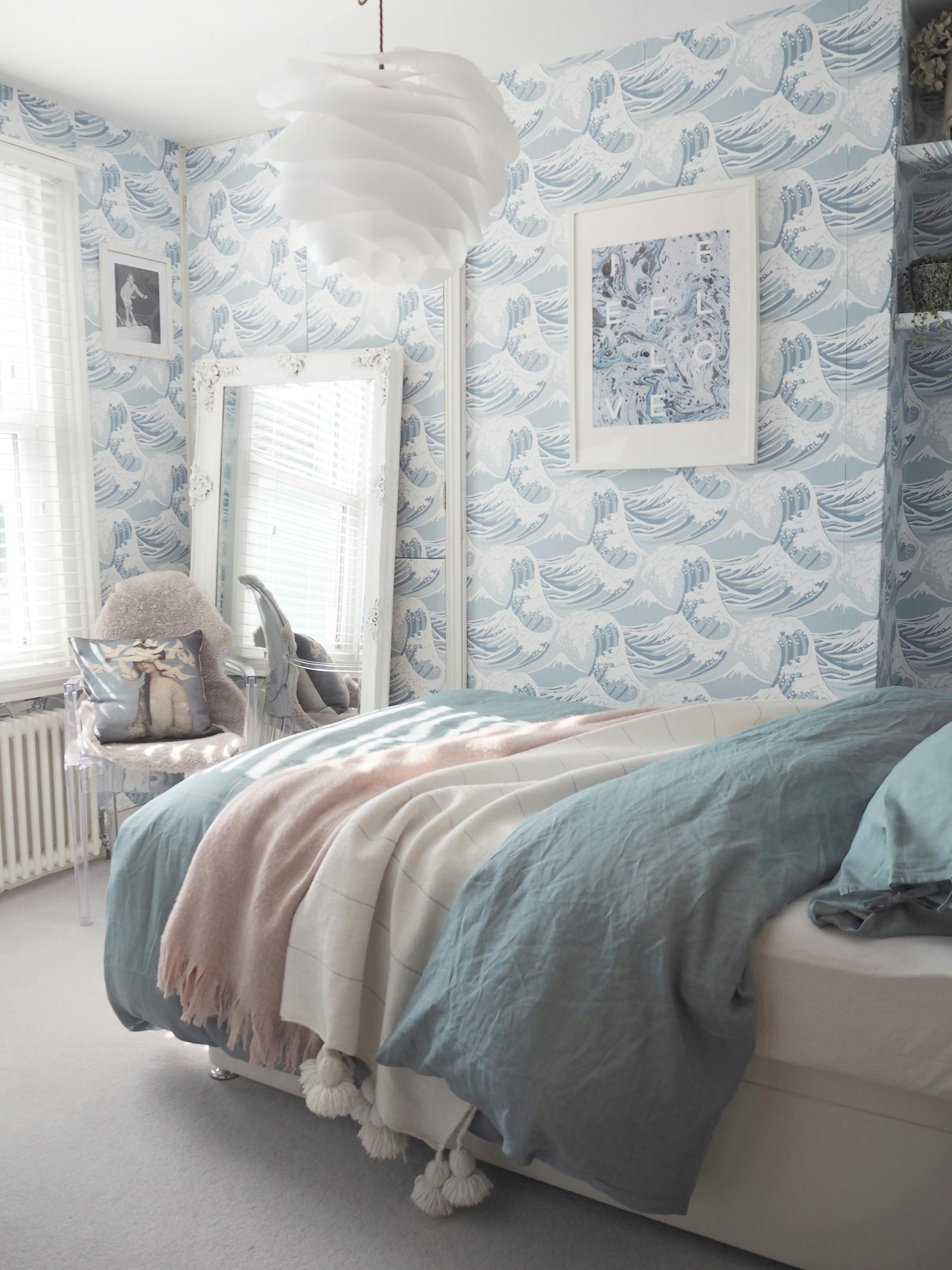 Bedroom with waves wallpaper