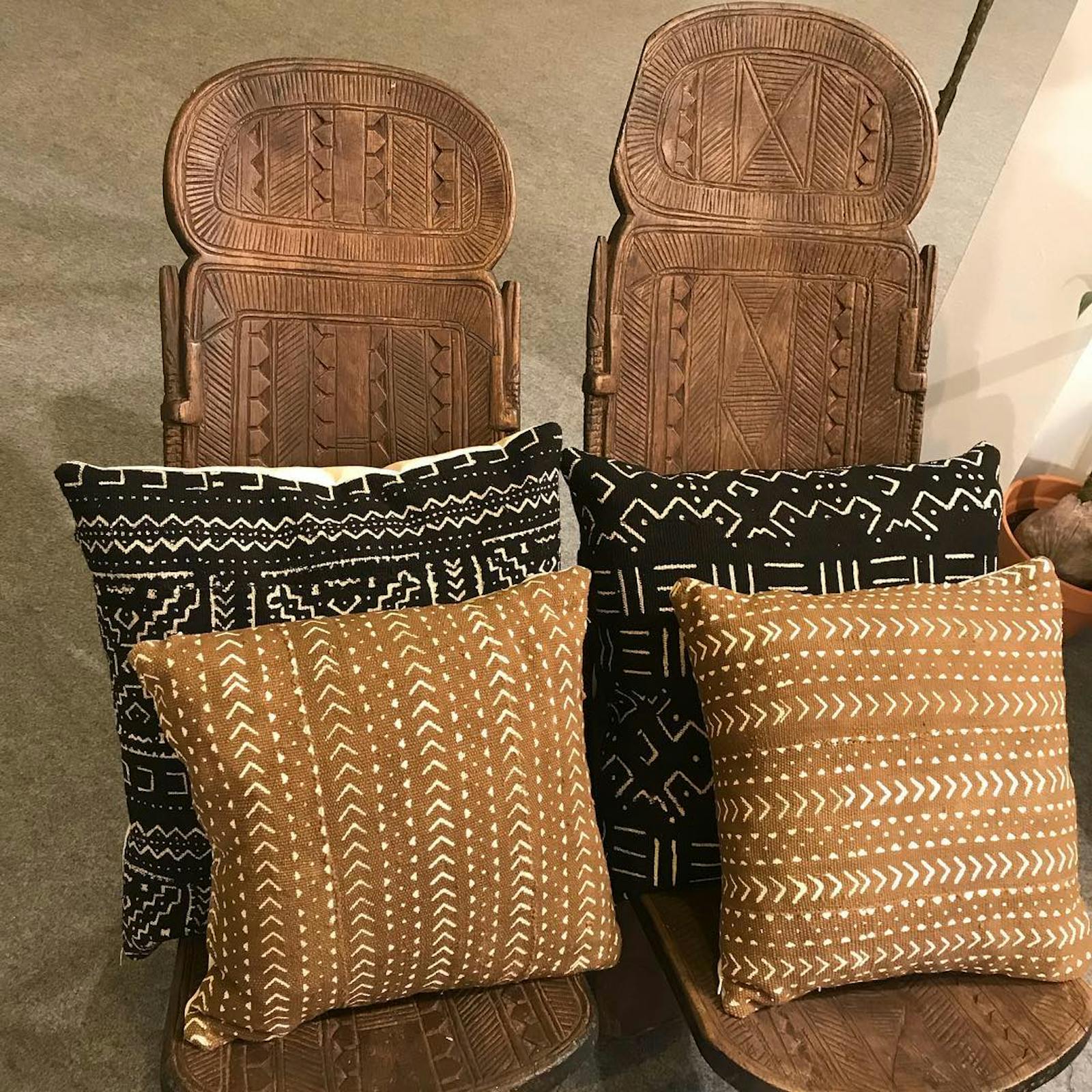 Mud cloth cushions on African style chair