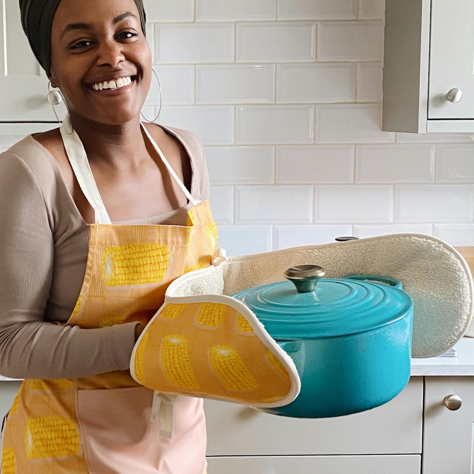 Woman holding a ceramic casserole dish