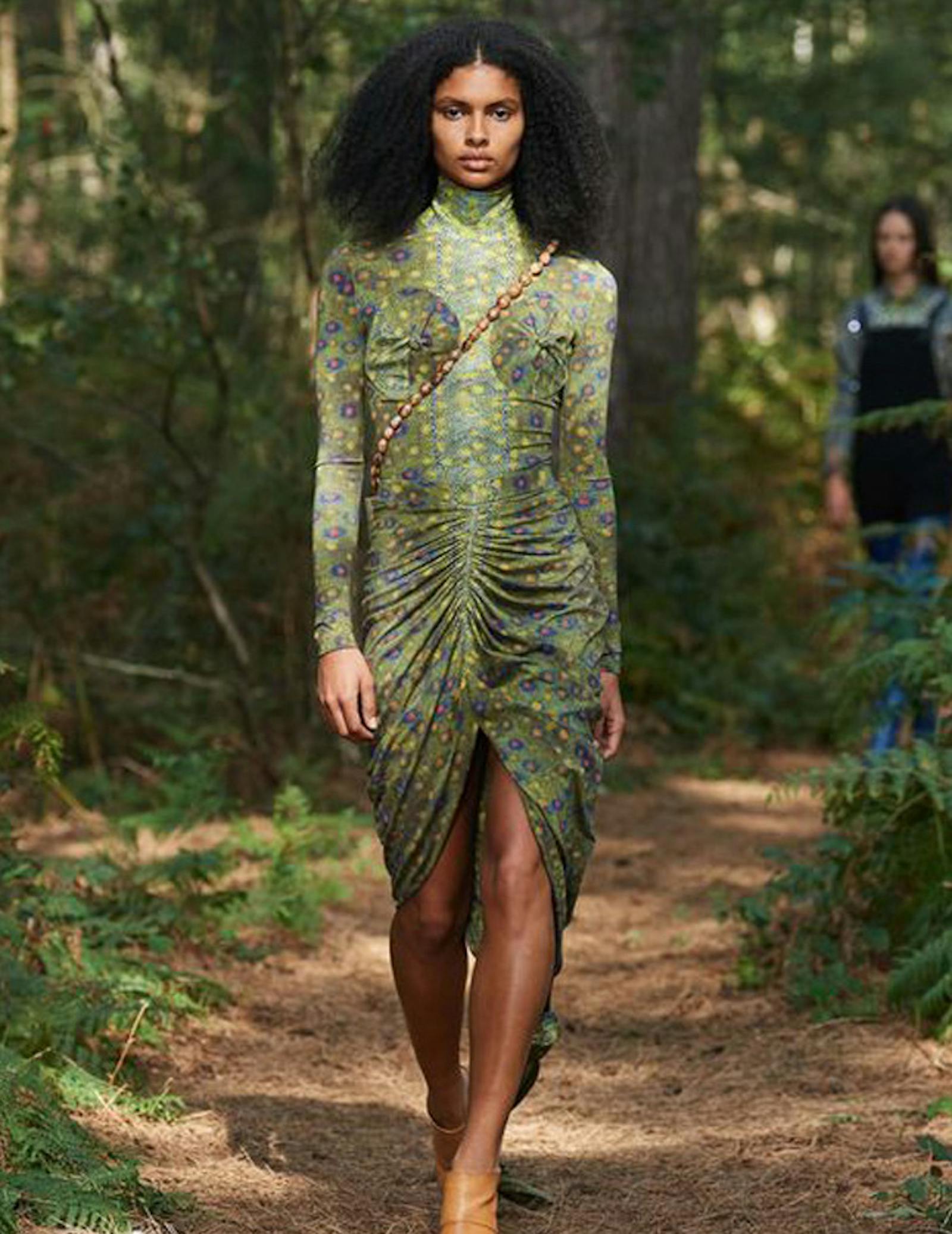 London fashion week shot of woman wearing green dress