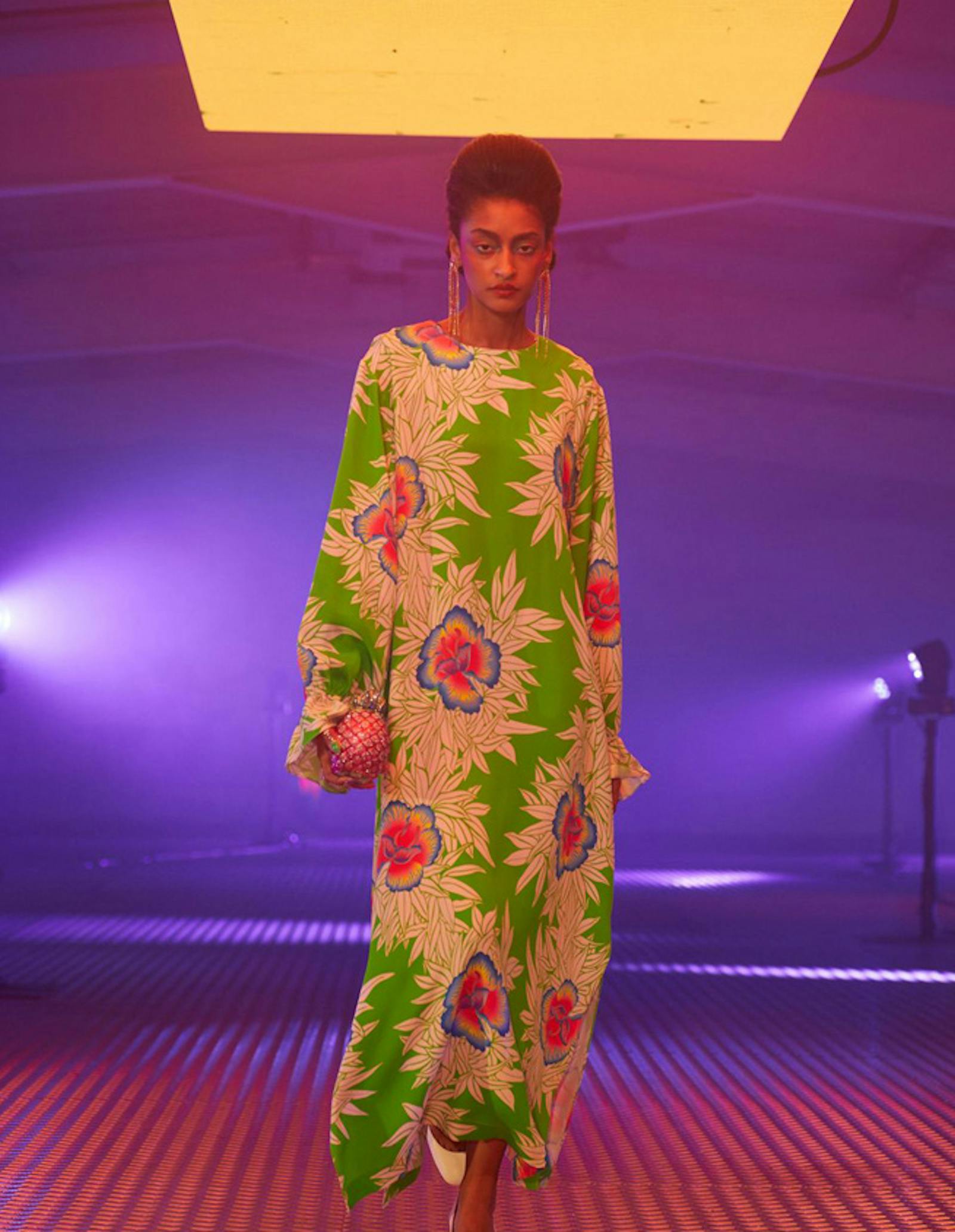 London fashion week shot of woman wearing floral exotic flower print on her dress