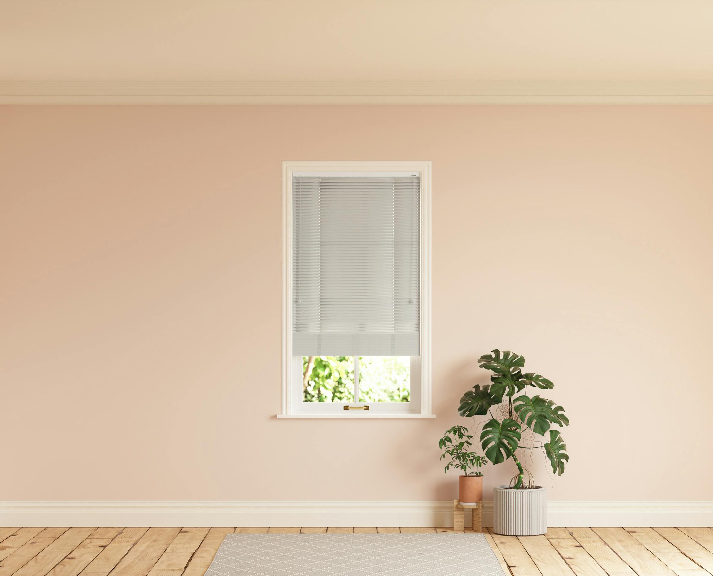 Room with walls painted in Lick Pink 02 and Grey 03 Venetian fine grain blinds