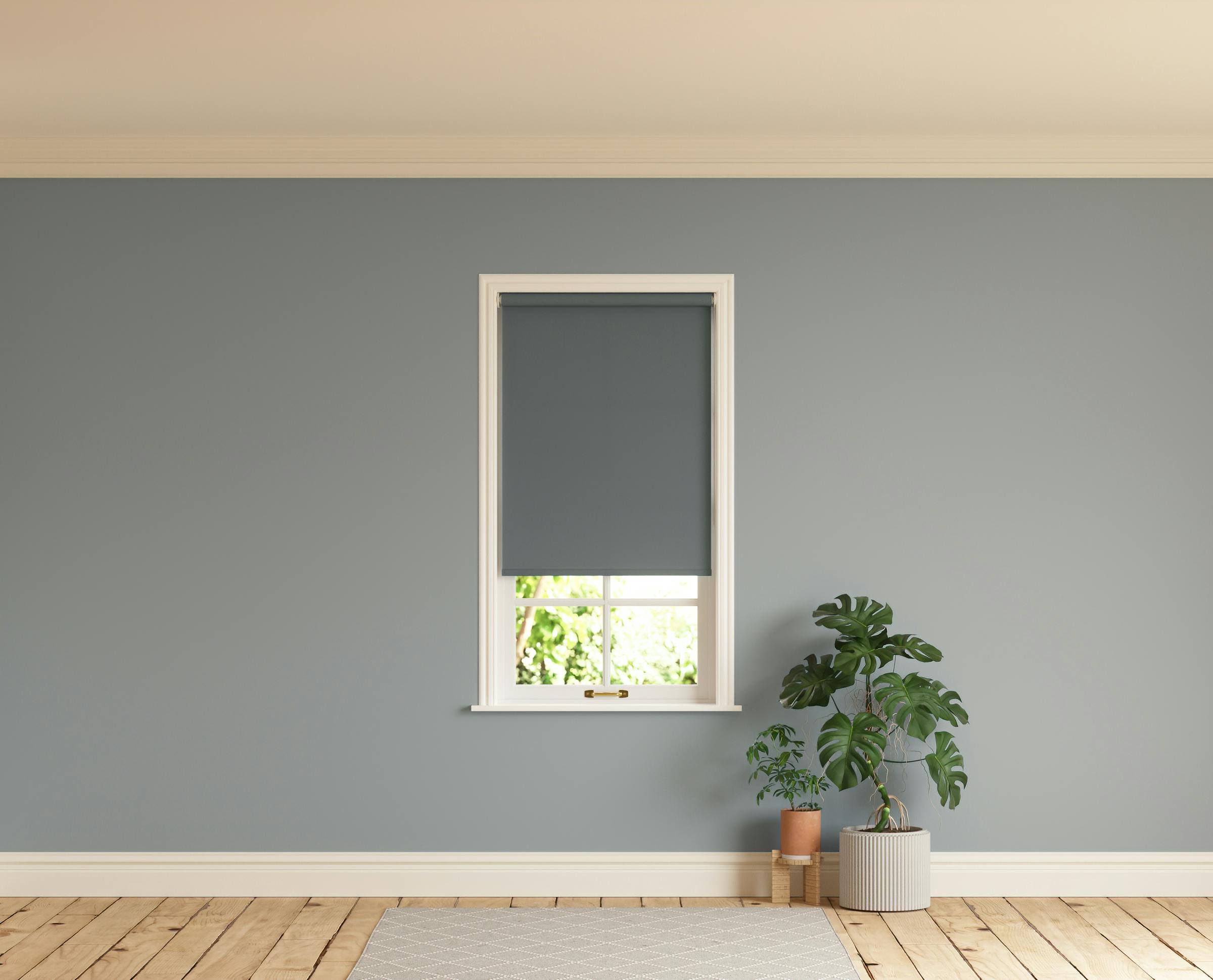 Room with walls painted in Lick Grey 06 and Grey 07 roller blinds