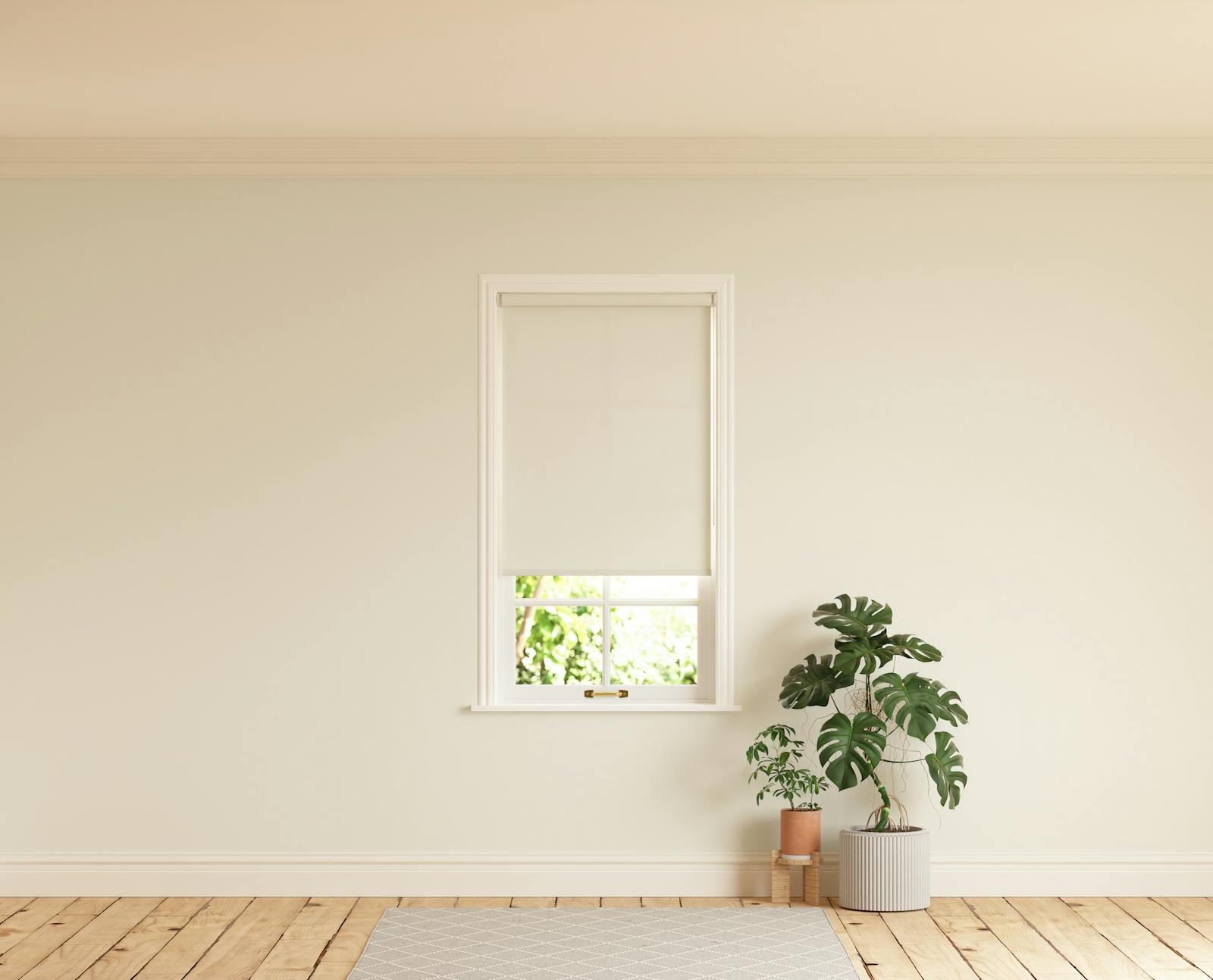 Room with walls painted in Lick White 05 and White 05 roller blinds