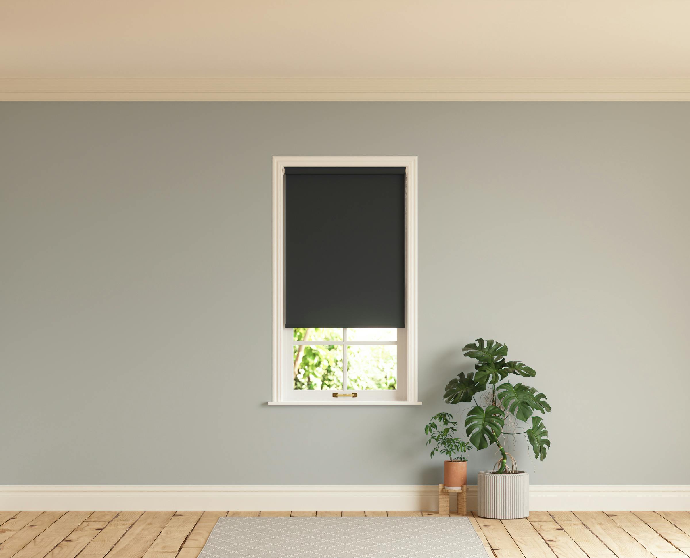 Room with walls painted in Lick Grey 04 and Black 02 roller blinds