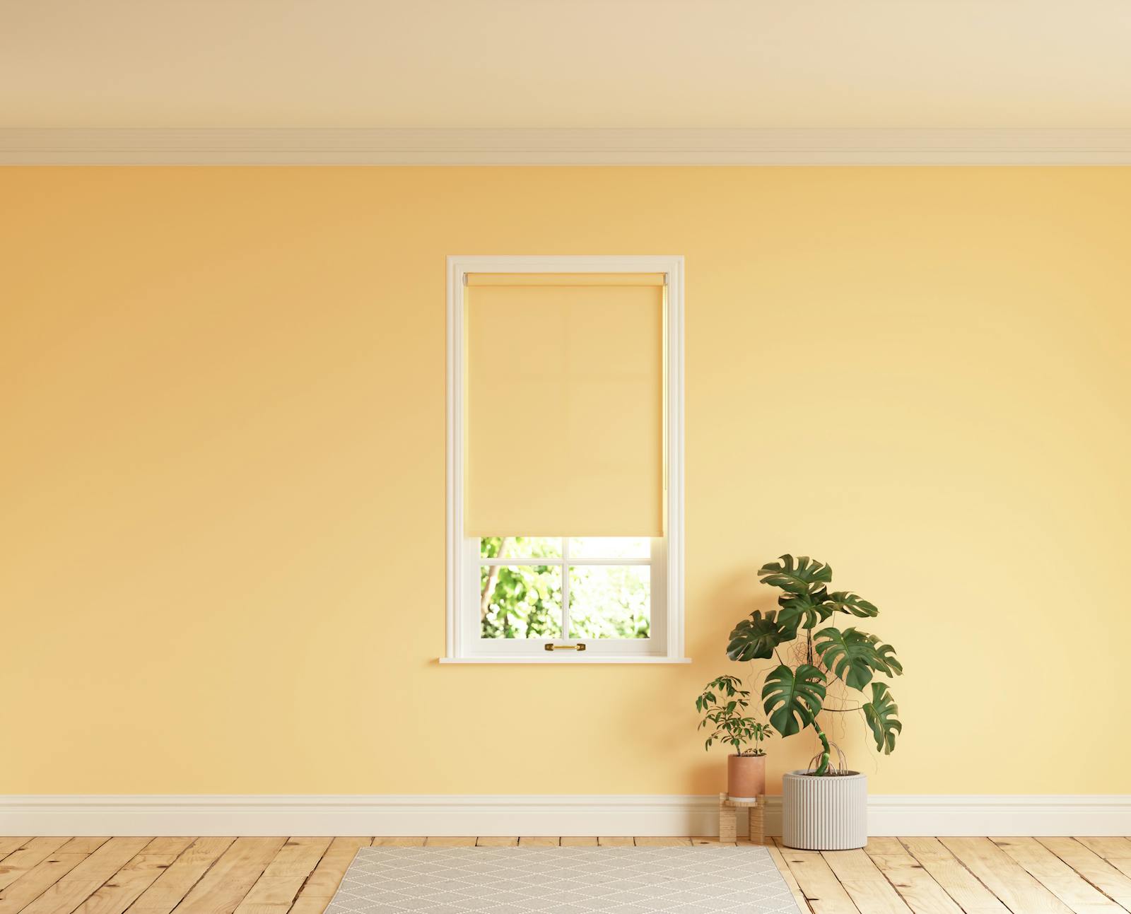 Room with walls painted in Lick Yellow 01 and Yellow 01 roller blinds