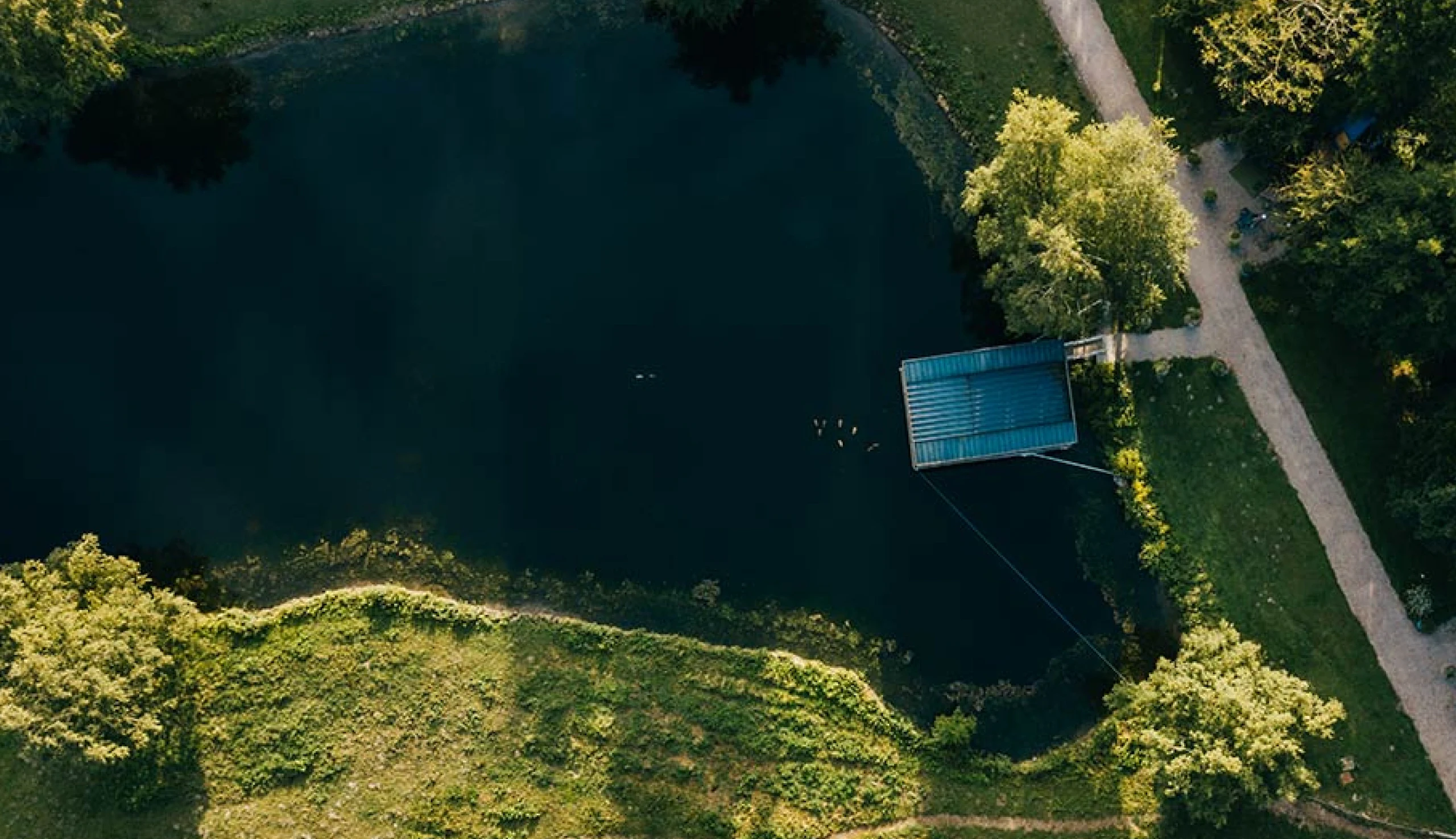 Aerial view of the House on the Water at Lieudieu, floating holiday rental in the middle of a pond, Bay of the Somme