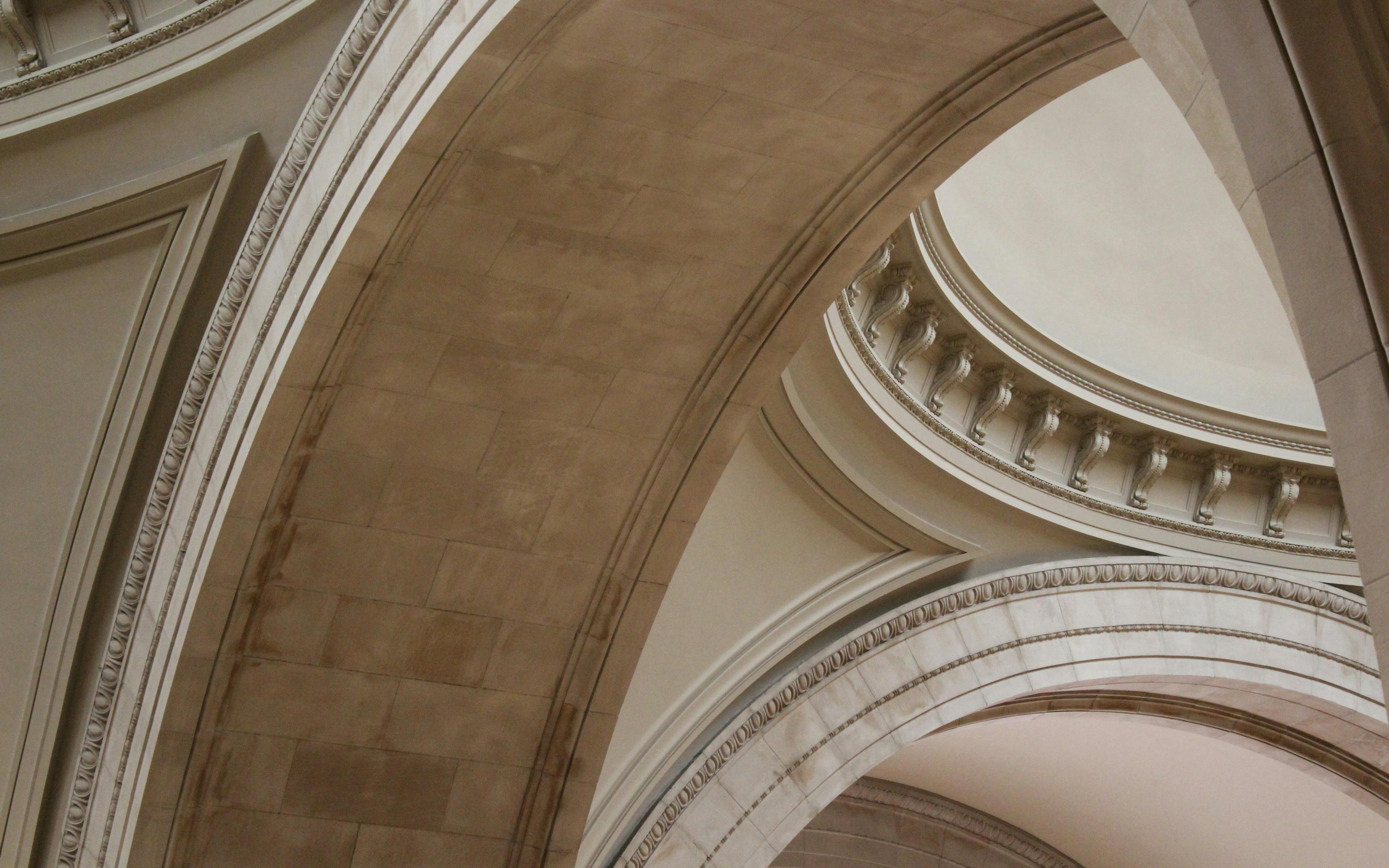 Museum roof architecture, curved stone arches.