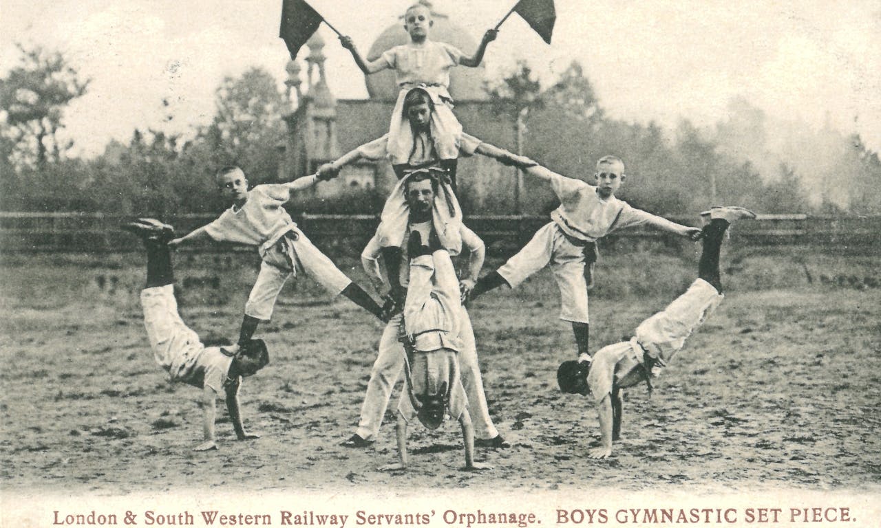 Postcard of London & South Western Railway Servants' Orphanage Boys Gymnastic Set Piece, Woking, c. 1914 LGM Heritage Collection