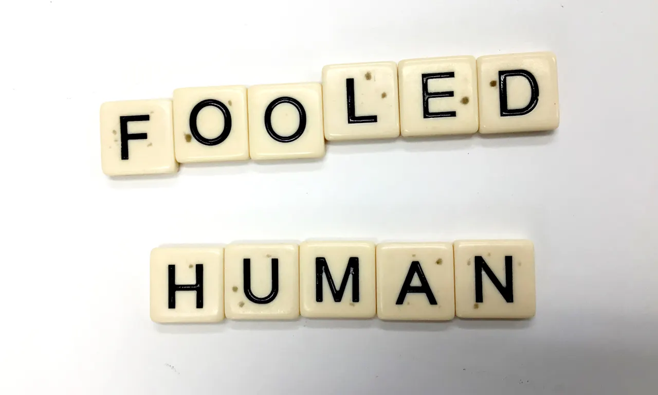 Scrabble letters reading Fooled Human