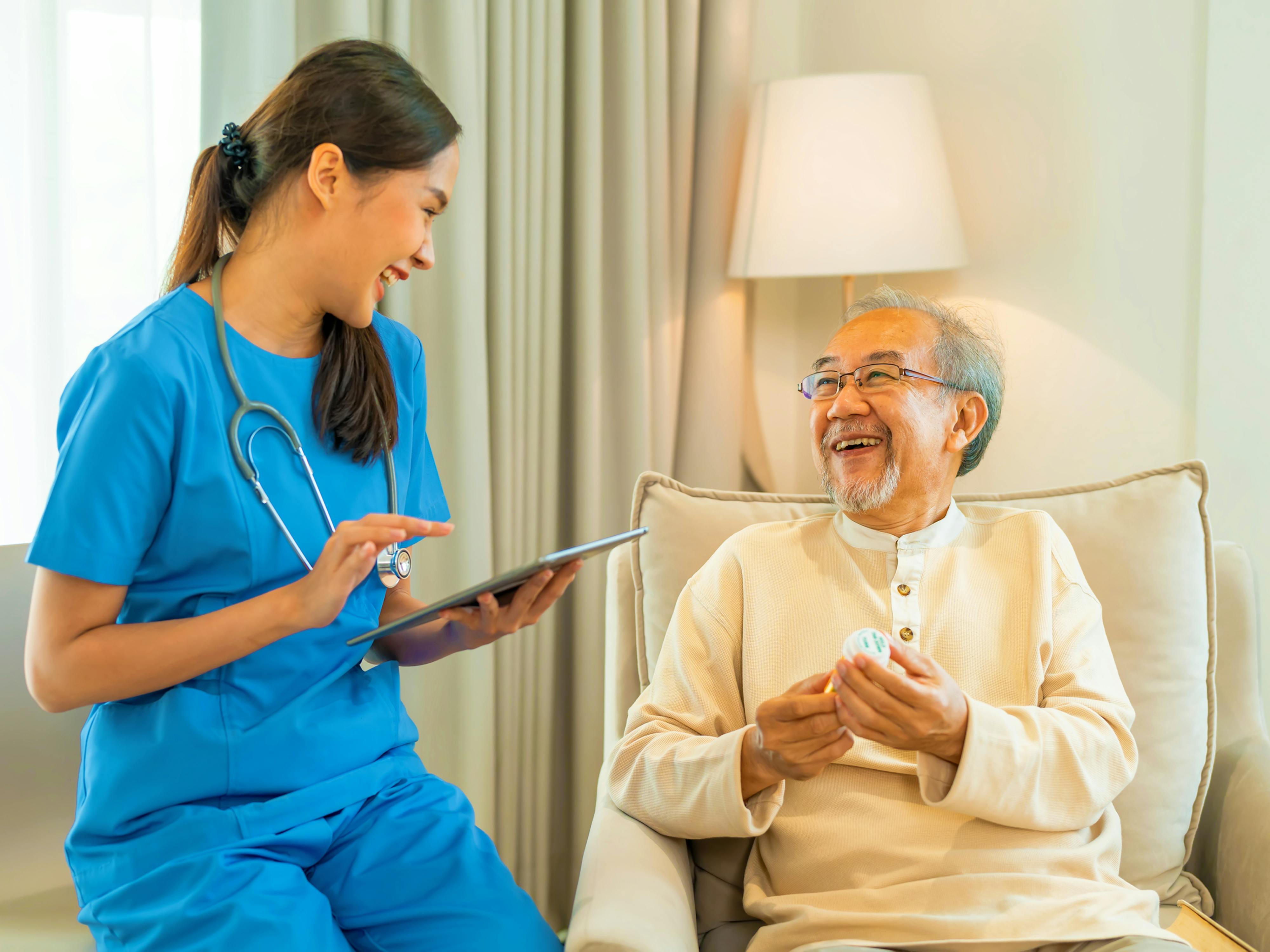 Doctor Laughing with Patient