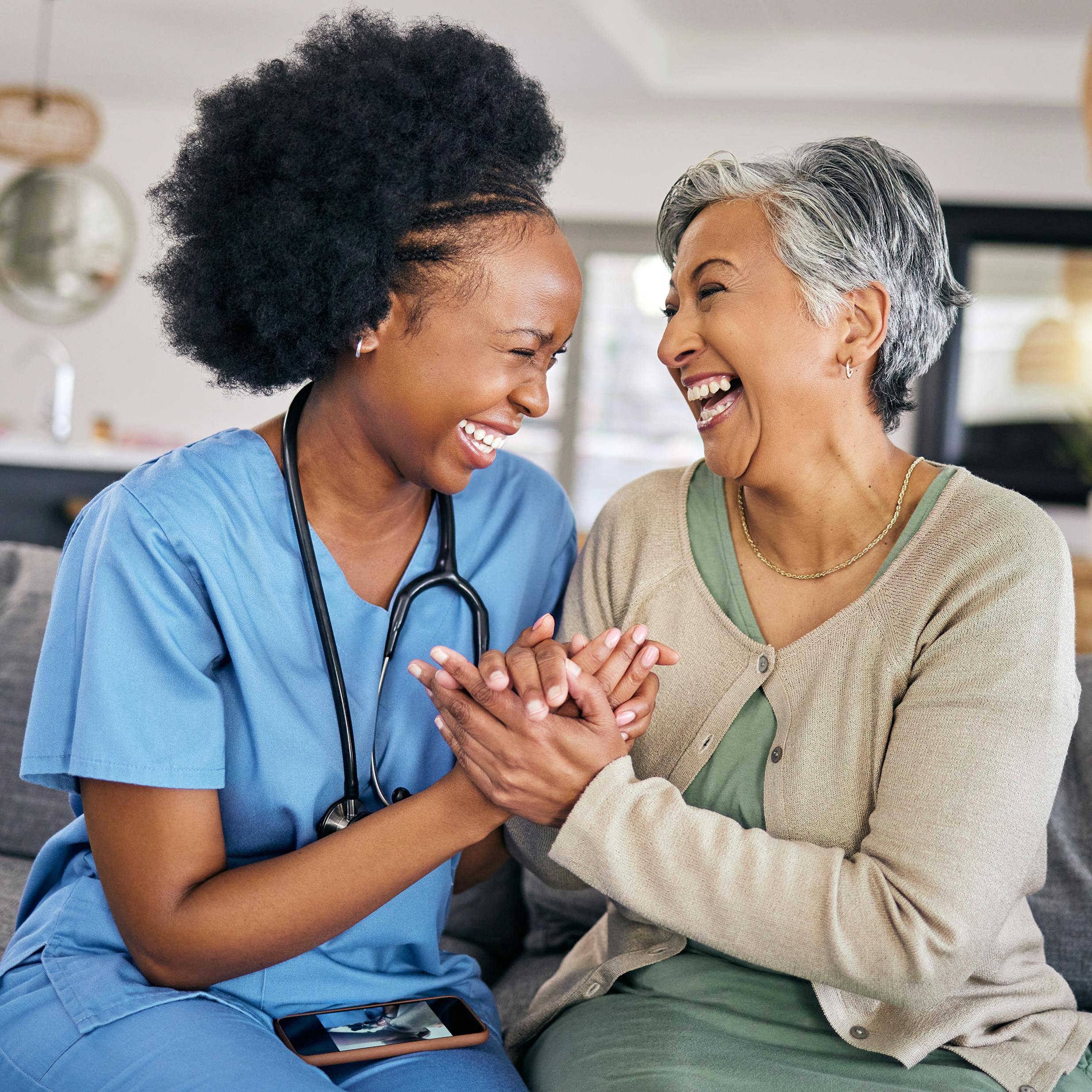 Nurse Laughing with Patient