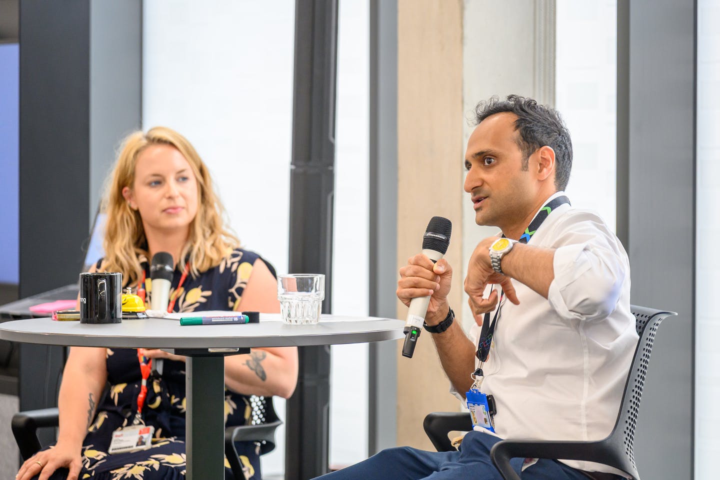 Male entrepreneur speaking on microphone at Venture Builder
