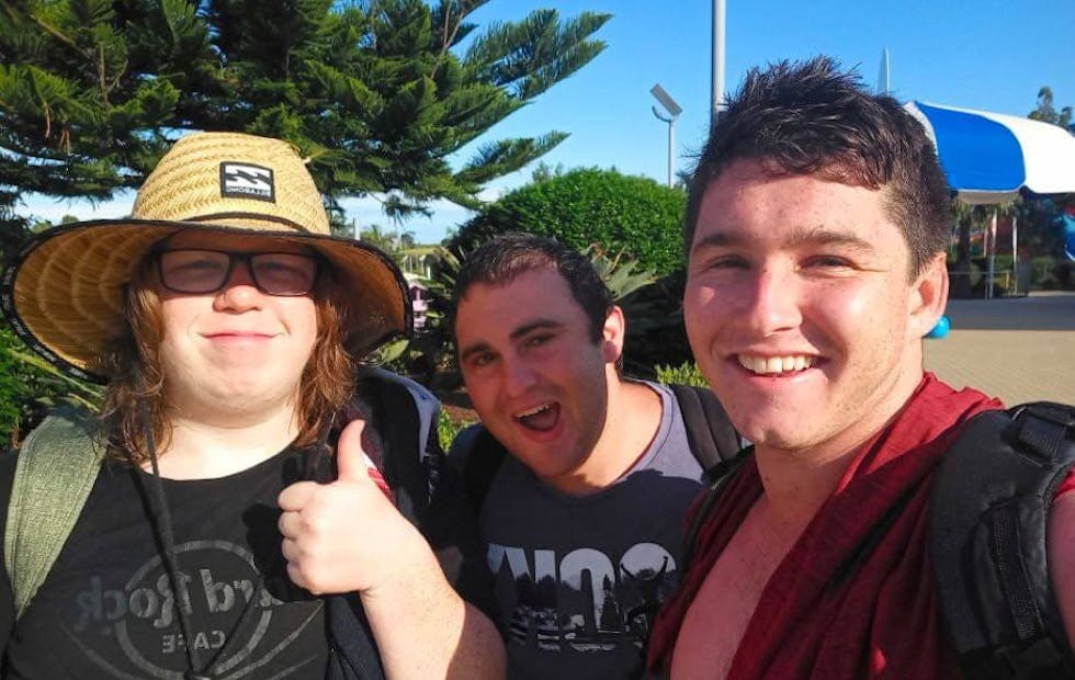 3 people on a group hiking trip with Like Family