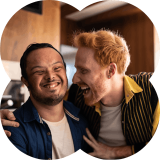 Like Family member and support worker laughing together