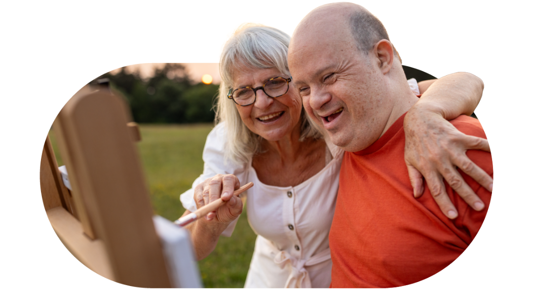 member carer painting together