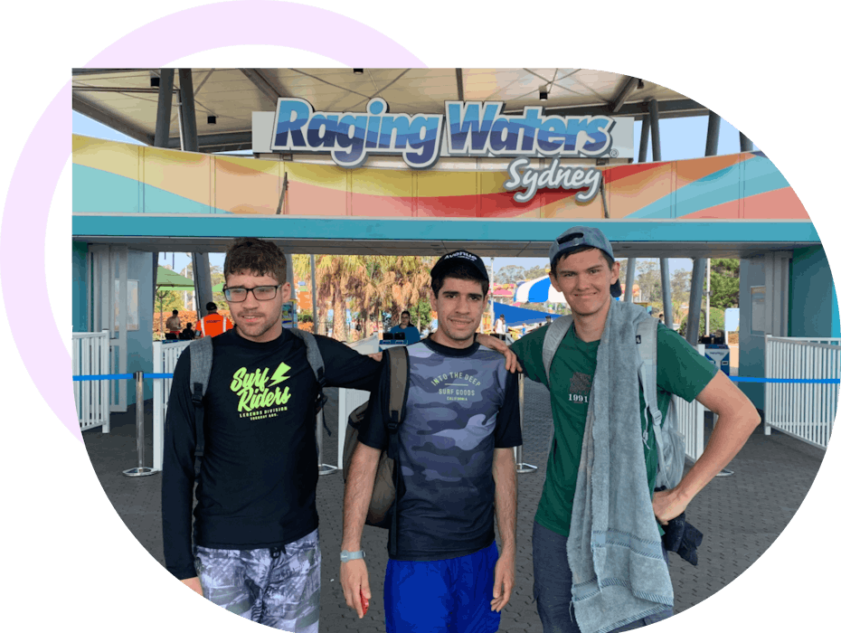 3 men standing in front of Raging Waters Sydney