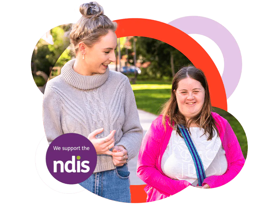 A Like Family support worker and her young Member. A purple "We support the NDIS" logo is on their left