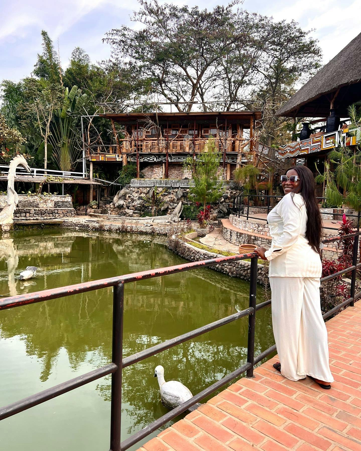 Linda standing near a river
