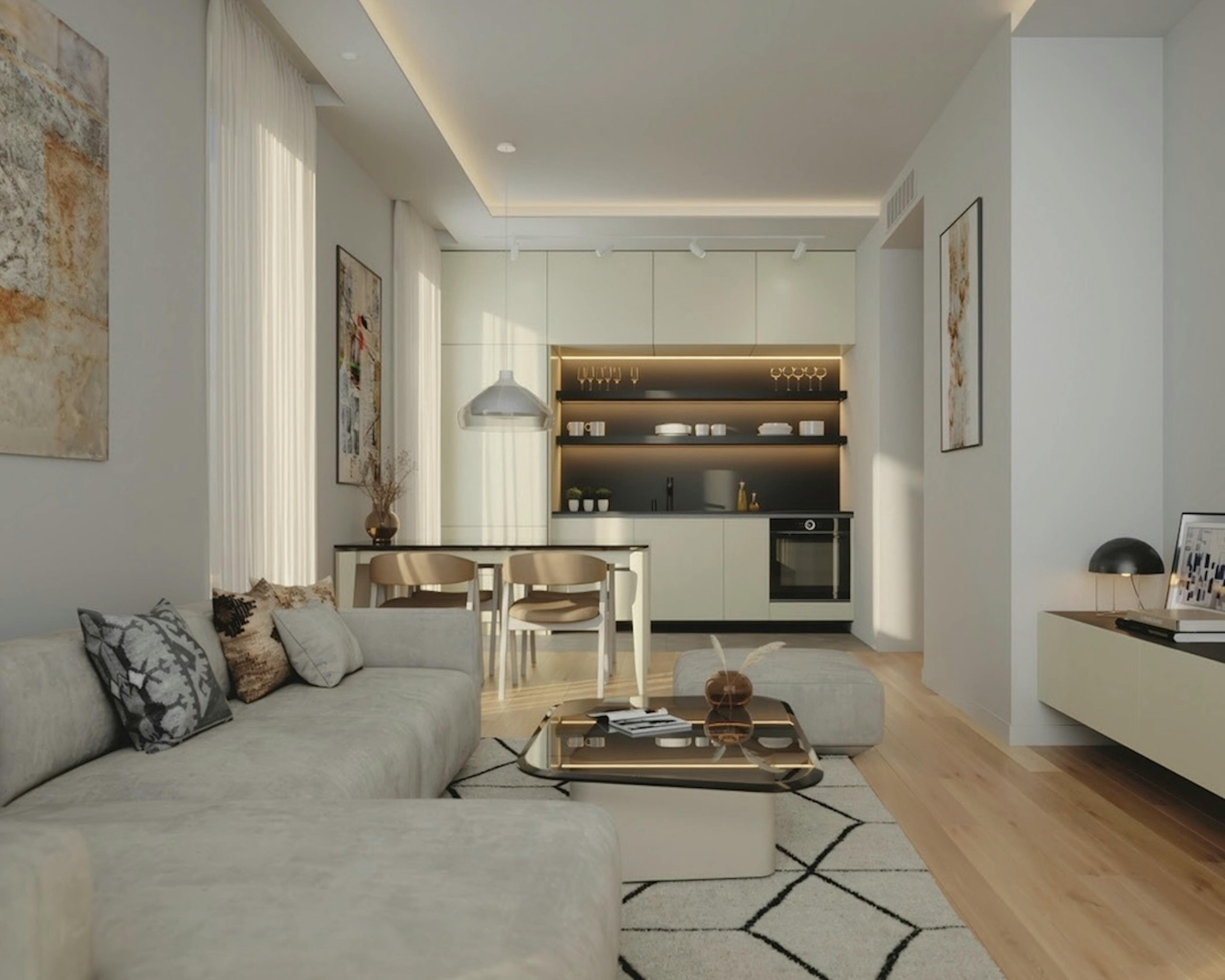 Dnevna soba sa trpezarijom i otvorenom kuhinjom - kompaktno, funkcionalno organizovan i dobro osvetljen prostor.