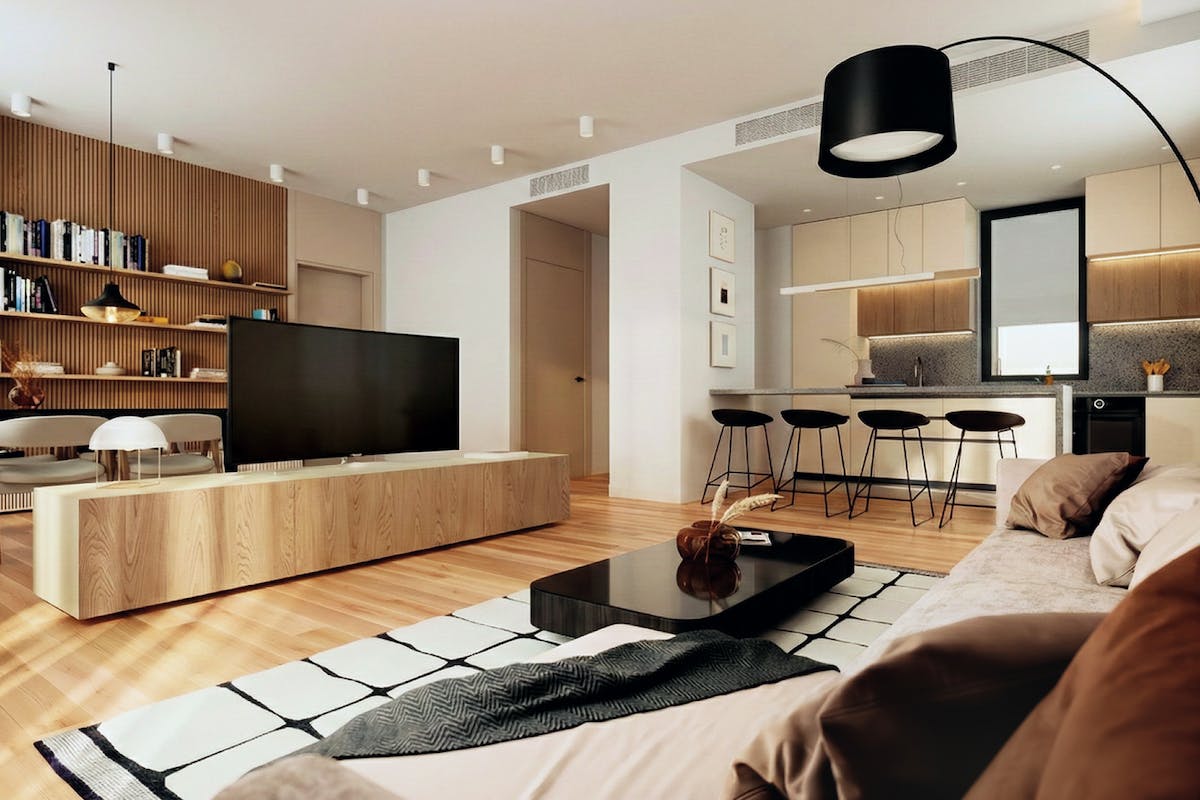 Prostran i dobro osvetljen dnevni boravak sa trpezarijom, kuhinjom i kuhinjskim ostrvom.