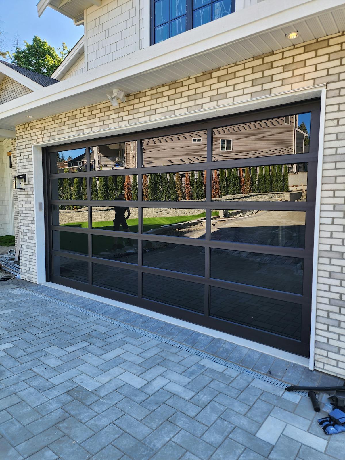 a magnificent installation of a 17'x9' Full View Hormann Modern Classic garage door