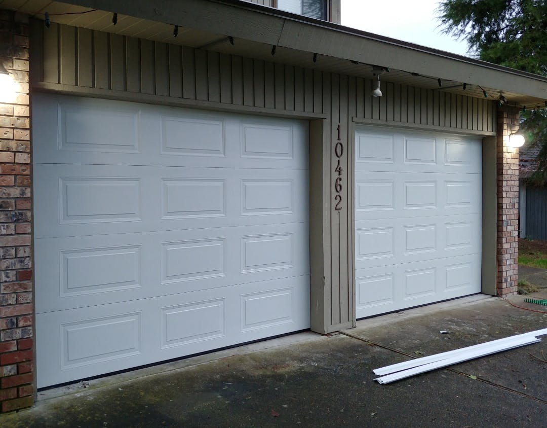 a pair of 9'x7" T-12 Garage Doors from Steel-Craft Door